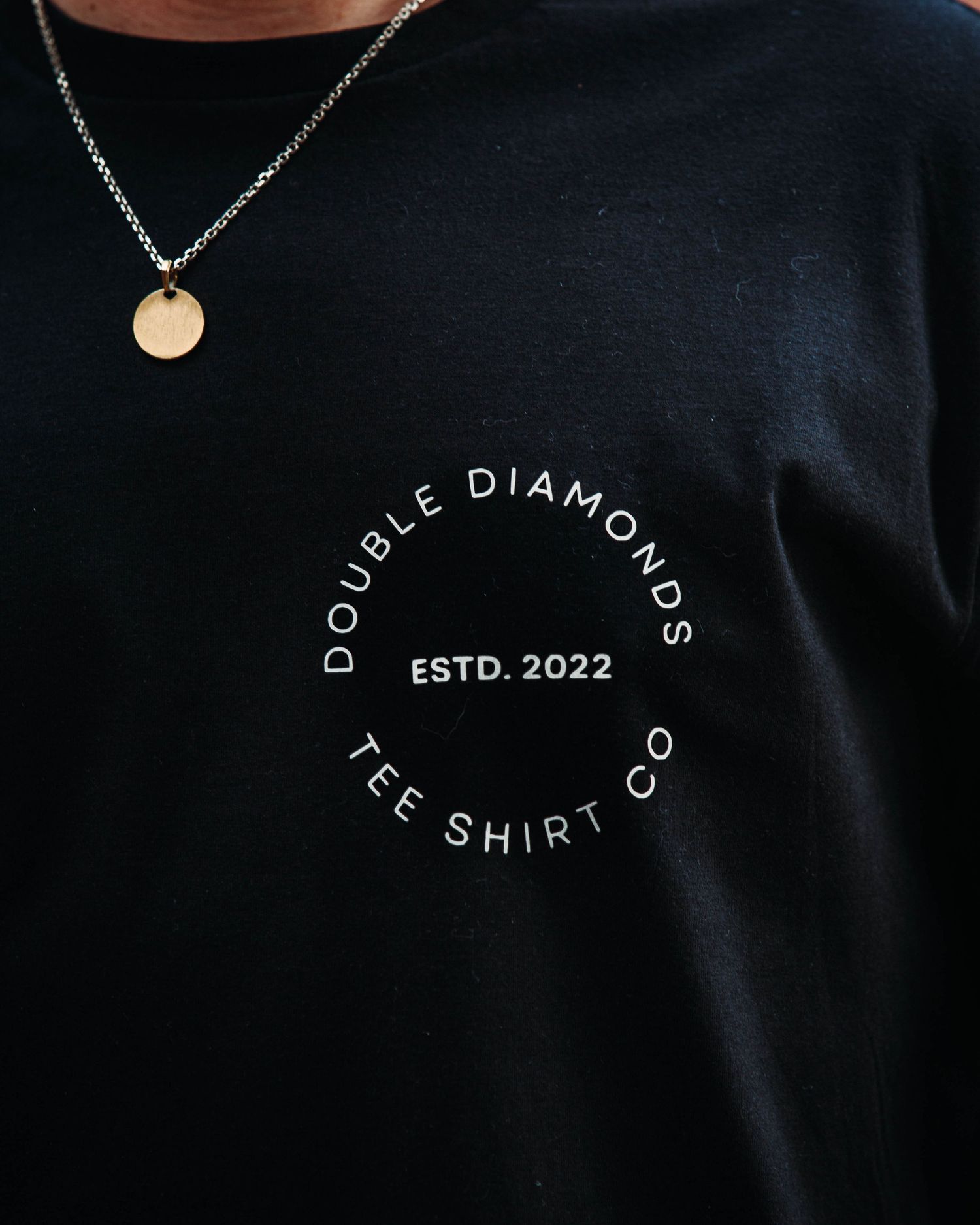 Branded photoshoot, close up of Double Diamonds T-Shirt logo