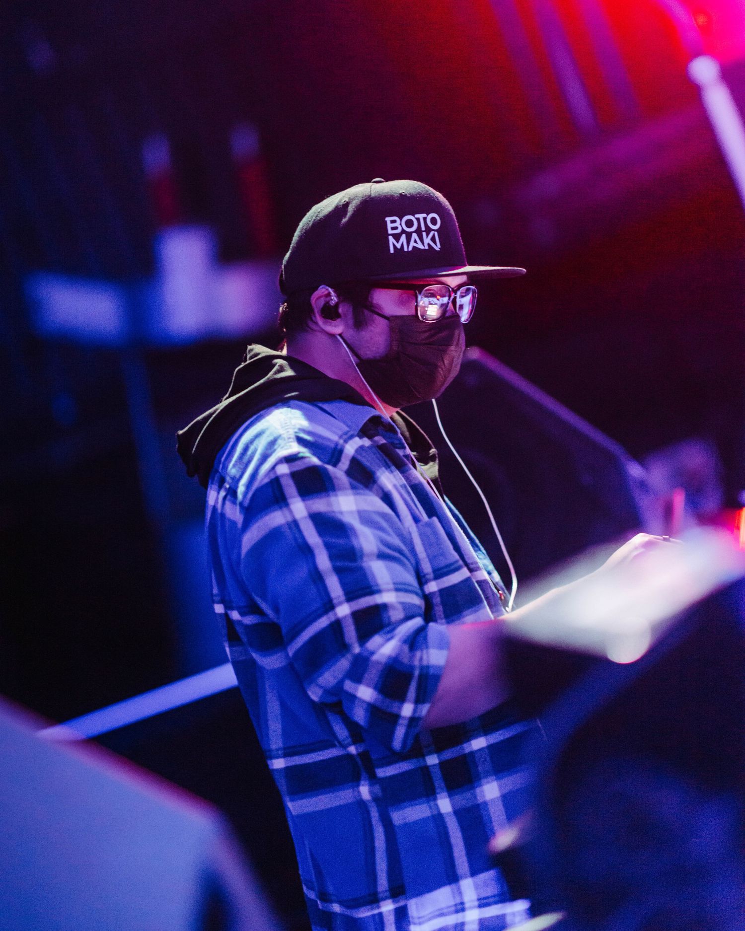Close up shot of DJ Botomaki, performing the opening set at Club Vinyl