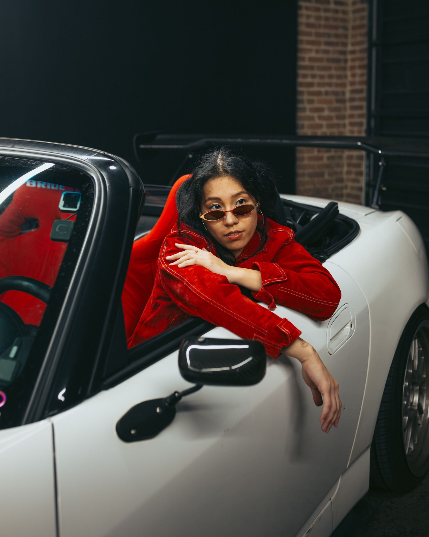 Creative project, Model sitting in an Honda S2000, posing during a Y2K Car Meet Event at CoCo Event Group's Creator Meer up