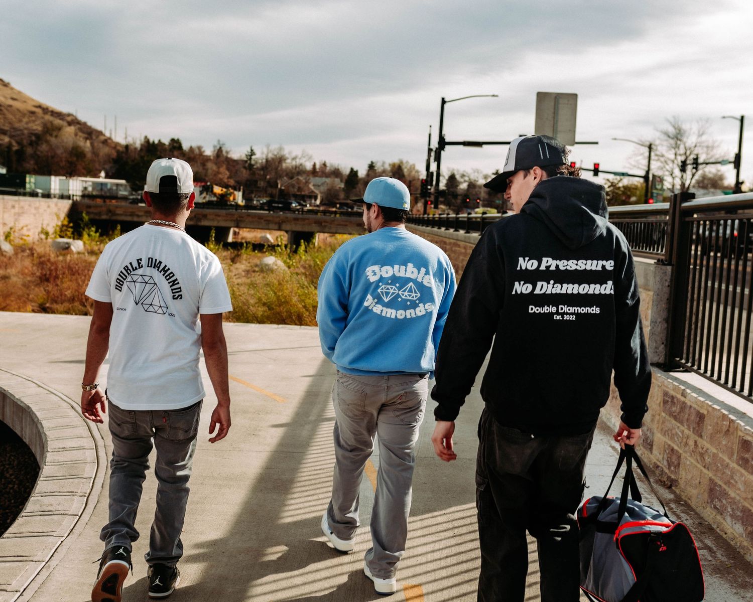 Group of friends, walking and posing for a branded/lifestyle photoshoot for Denver Colorado clothing brand, Double Diamonds
