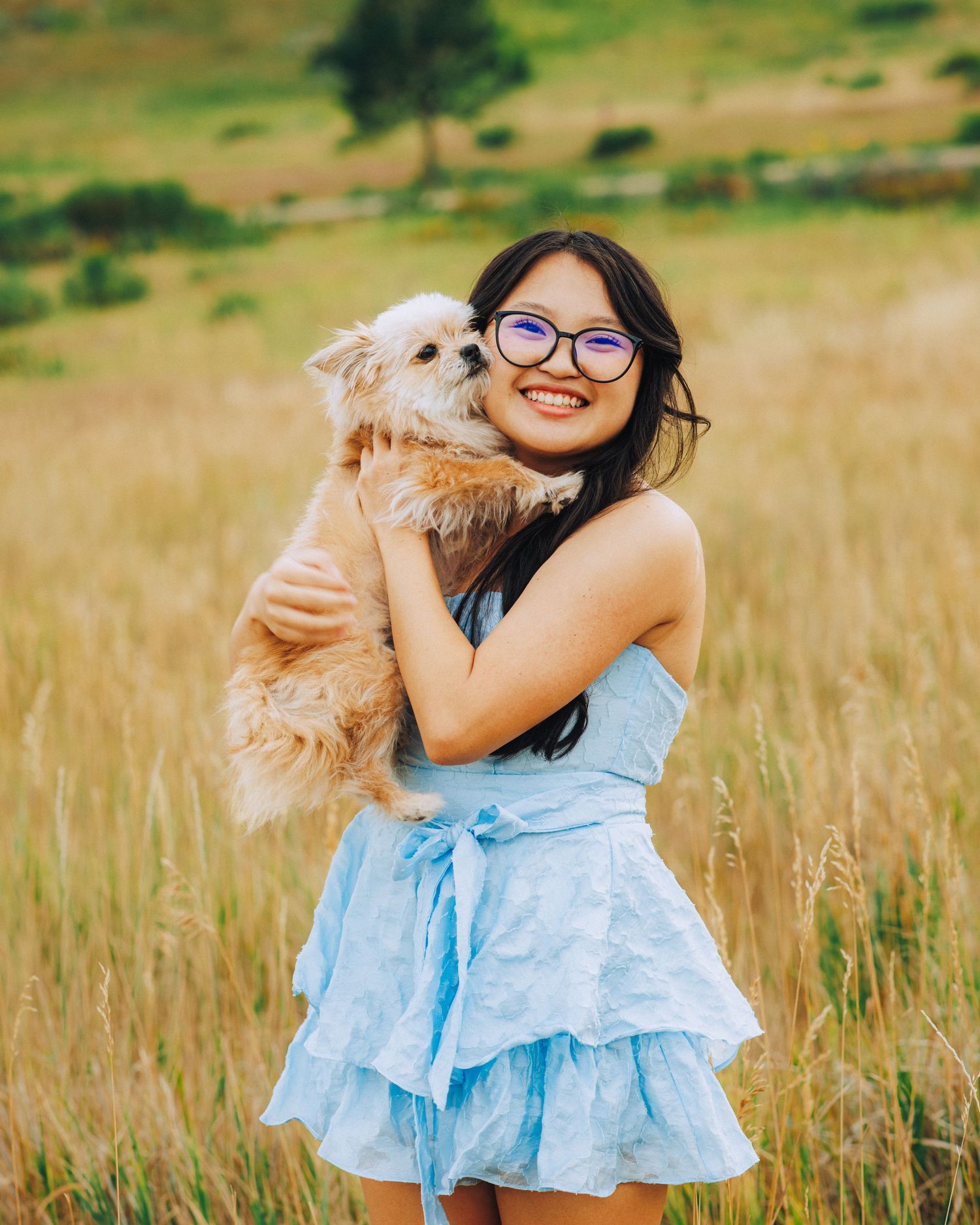 Senior portrait with her dog at South Valley Park in Colorado