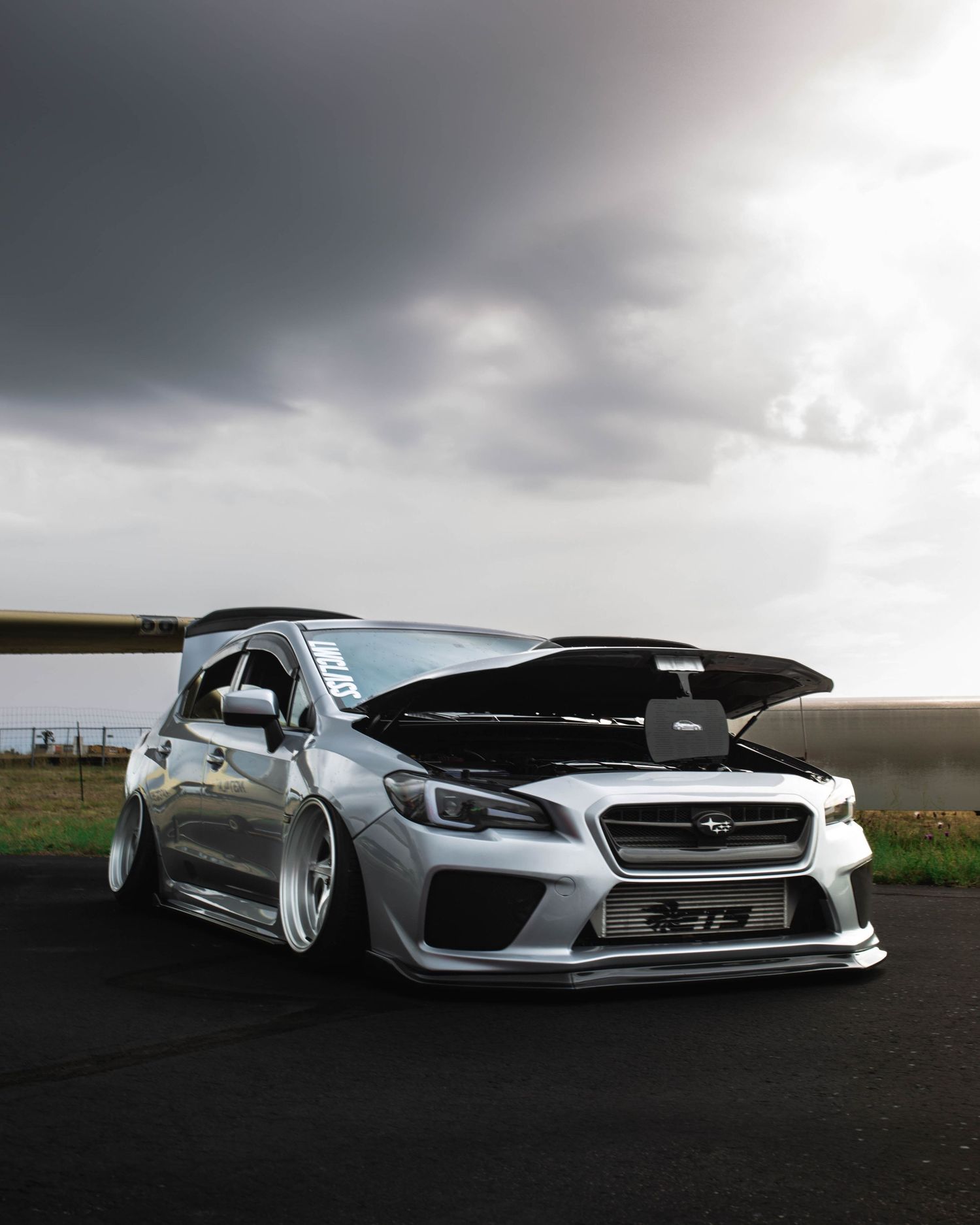 Front three quarters, Slammed Subaru WRX at the Peaked Selective Invitational, Wings Over the Rockies Air and Space Museum
