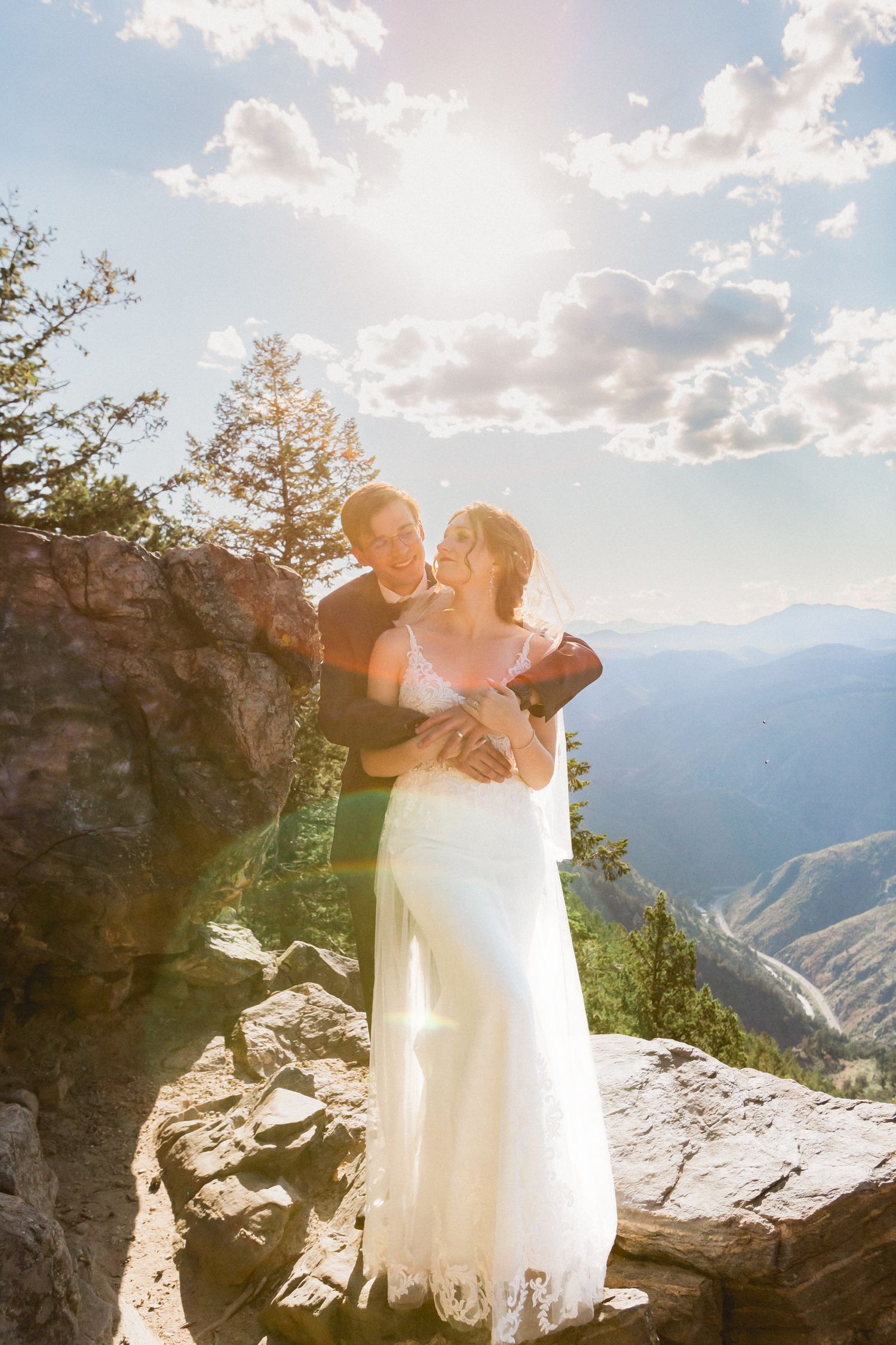 Krause Wedding, bride and groom posing for wedding photos, dancing around during sunset at Botecher Mansion/Lookout Mountain, in Colorado