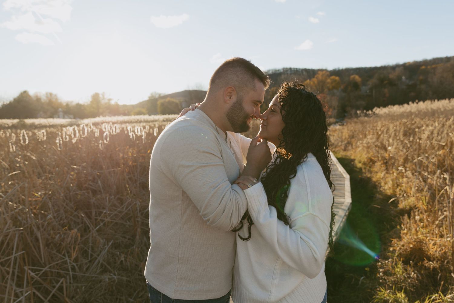 Cinematic fall couple photo at Vernon Boardwalk in Vernon, New Jersey in Sussex County