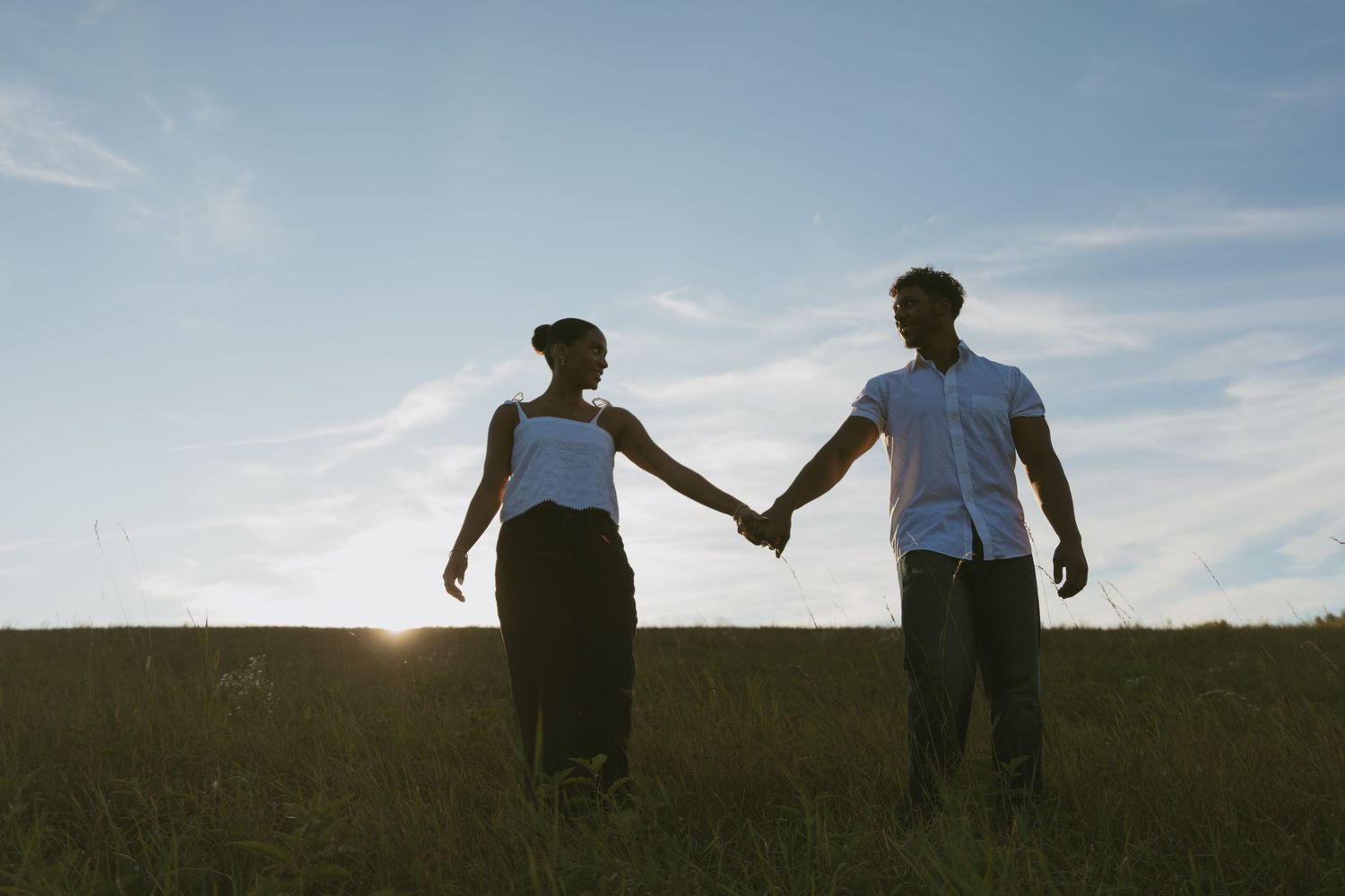 Cinematic couple photo in a field at sunset in Sussex County New Jersey