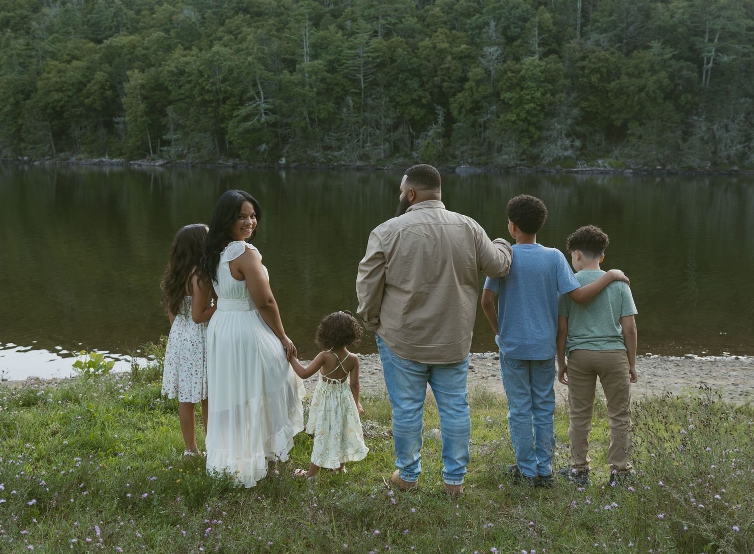Family photos in Sullivan County New York, Catskills along the water in a flower field