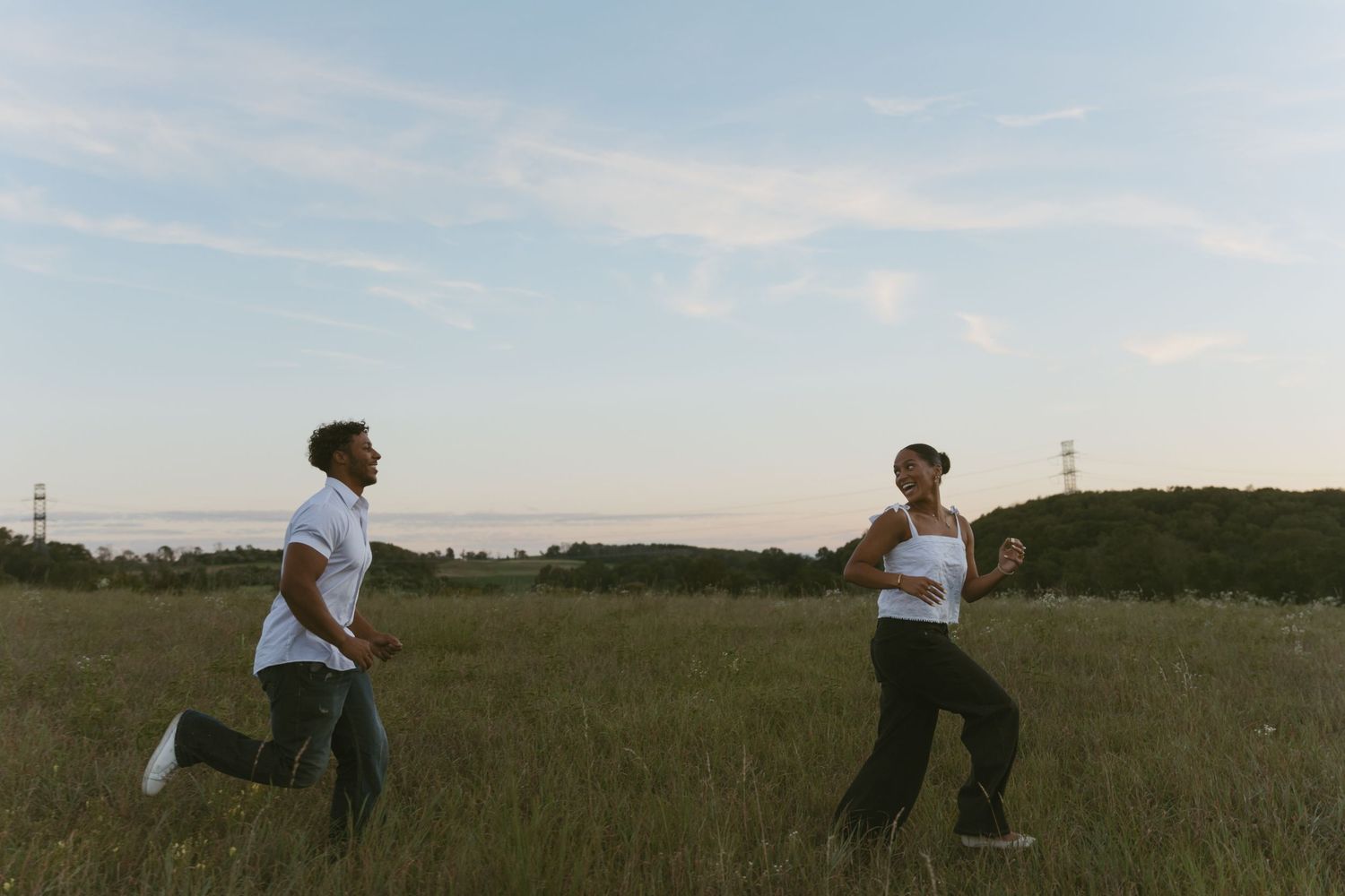 Cinematic Couple photo in a field during golden hour in Sussex County New Jersey