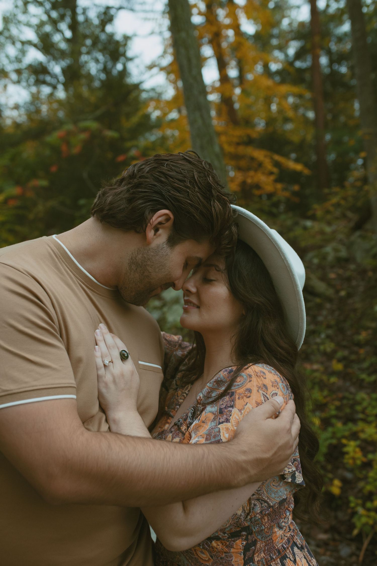 Cinematic fall couple photo in the woods in Sussex County New Jersey