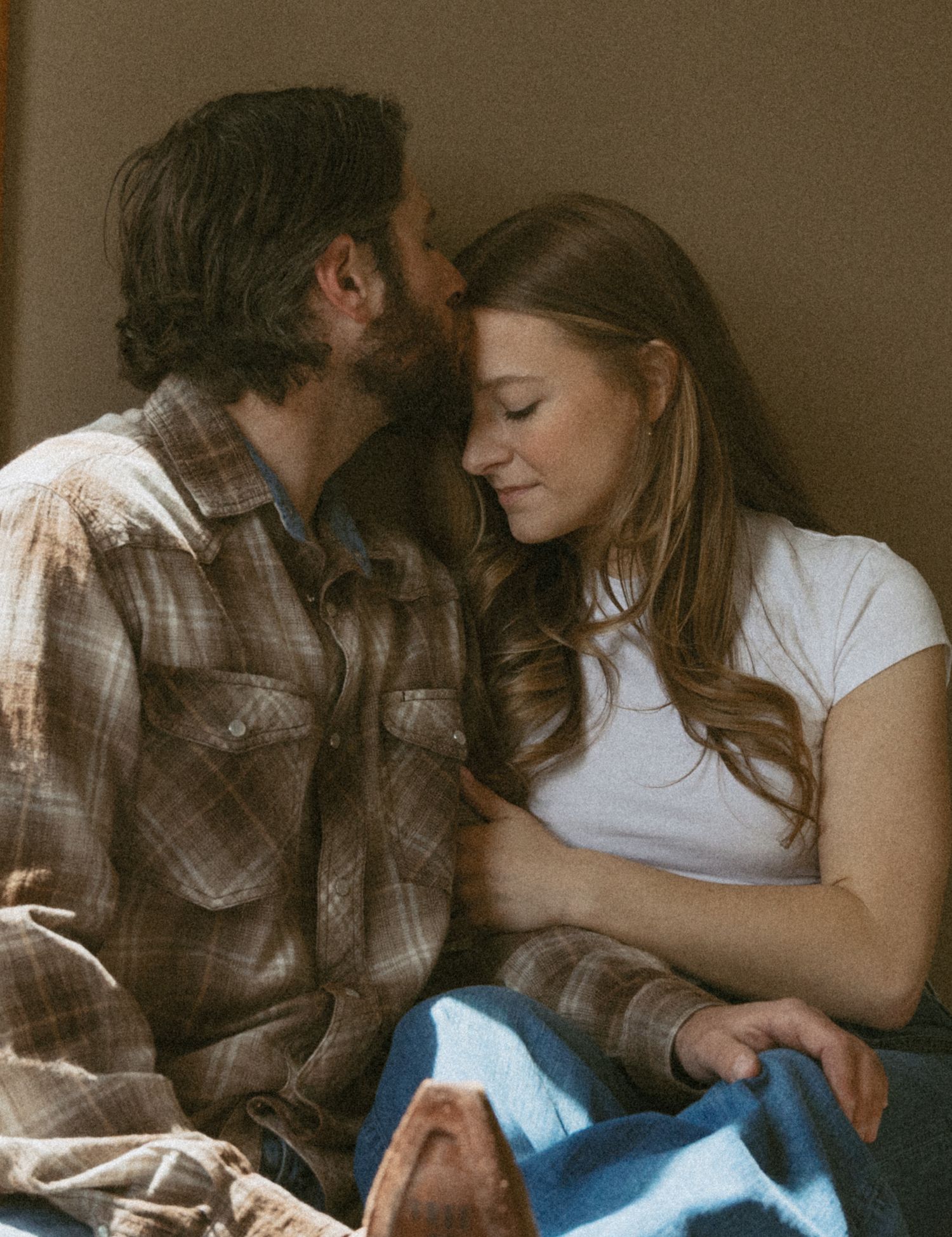 Cinematic and documentary in-home couple photo in the Catskill Mountains of New York