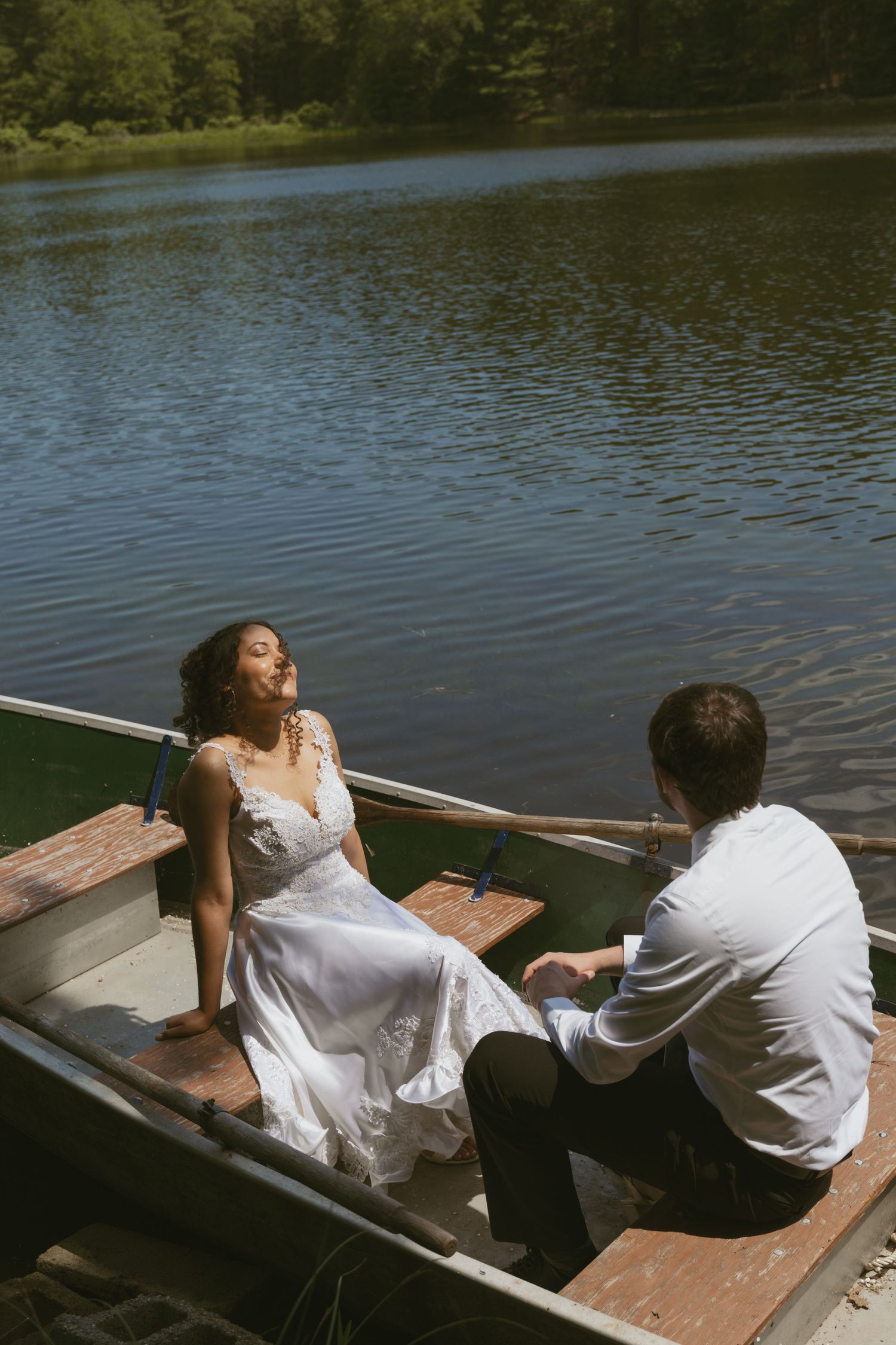Cinematic couple photo in a canoe along the Delaware River in the Catskill Mountains of New York