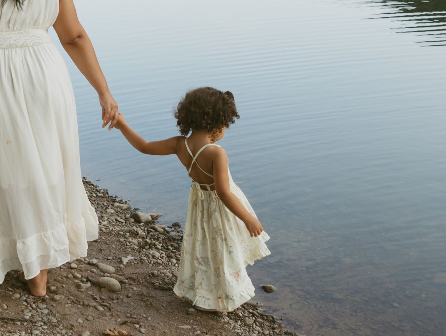 Toddler dipping her toes in water in Sullivan County New York, Catskills Family photoshoot