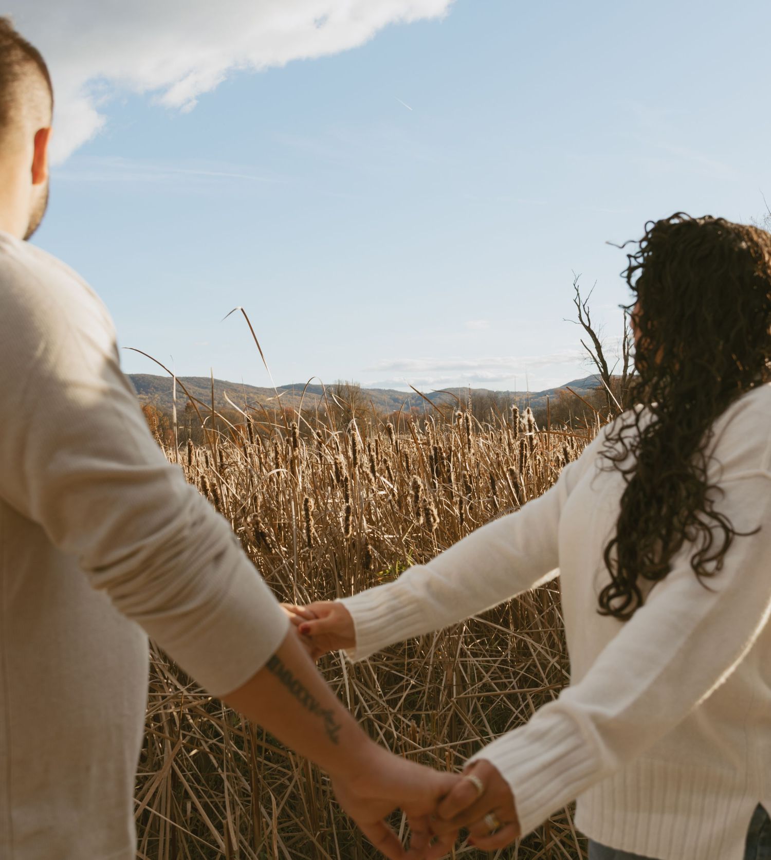 Cinematic fall couple photo at Vernon Boardwalk in Vernon, New Jersey in Sussex County