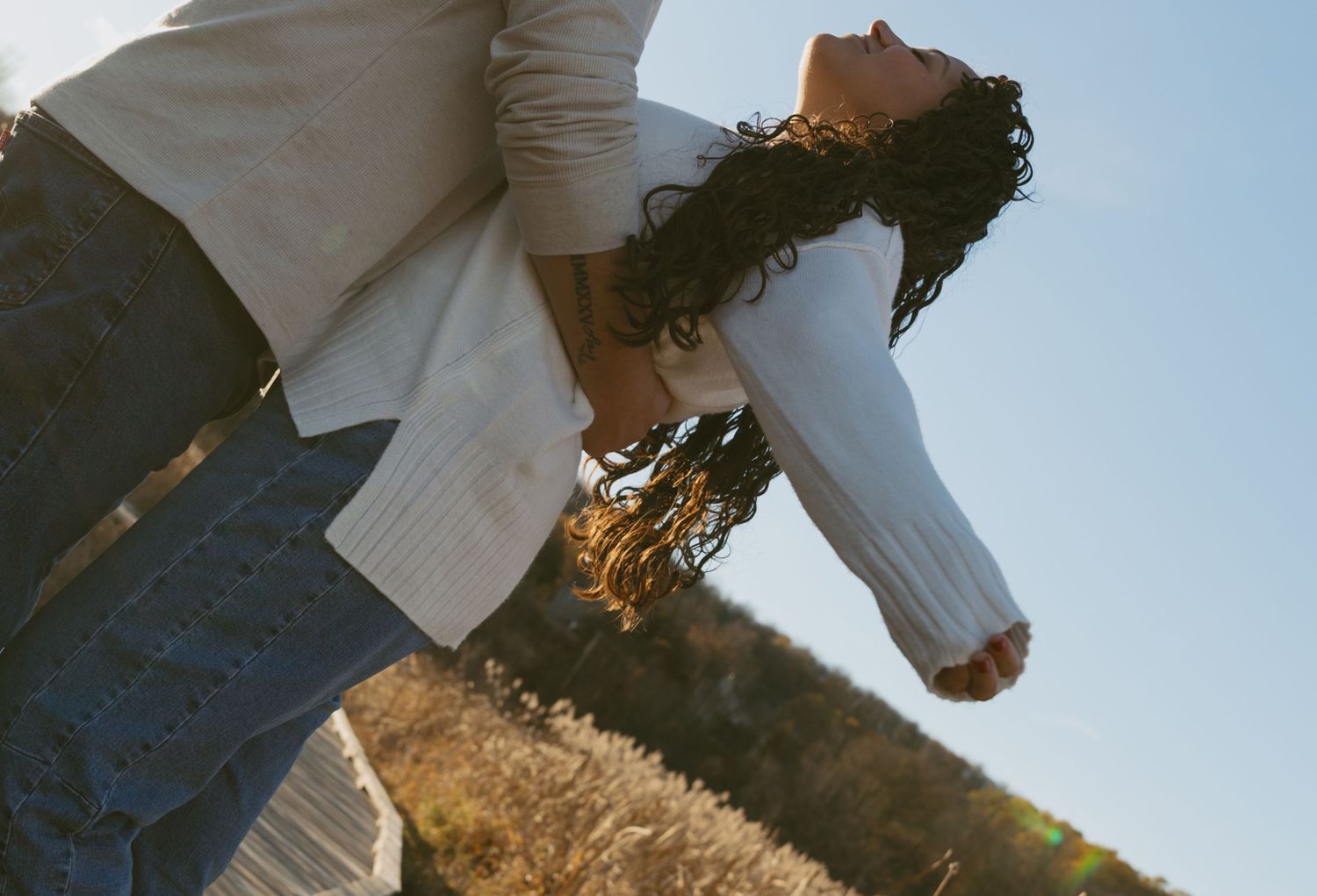 Cinematic fall couple photo at Vernon Boardwalk in Vernon, New Jersey in Sussex County