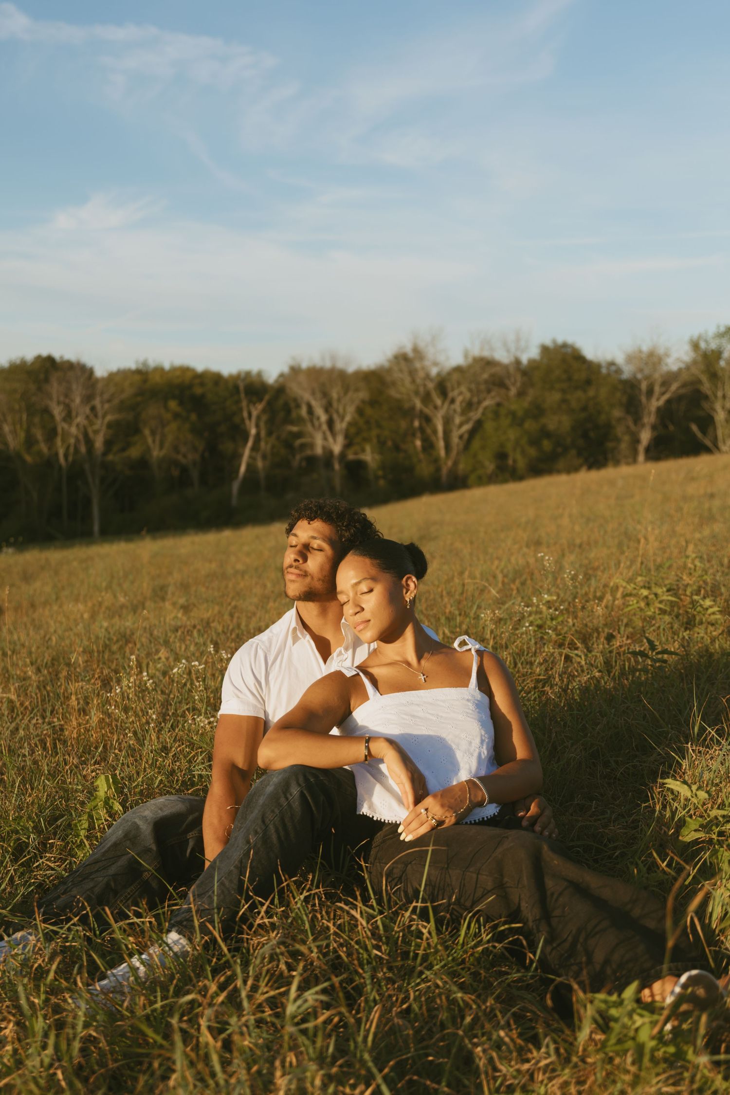 Cinematic Couple photo in a field during golden hour in Sussex County New Jersey