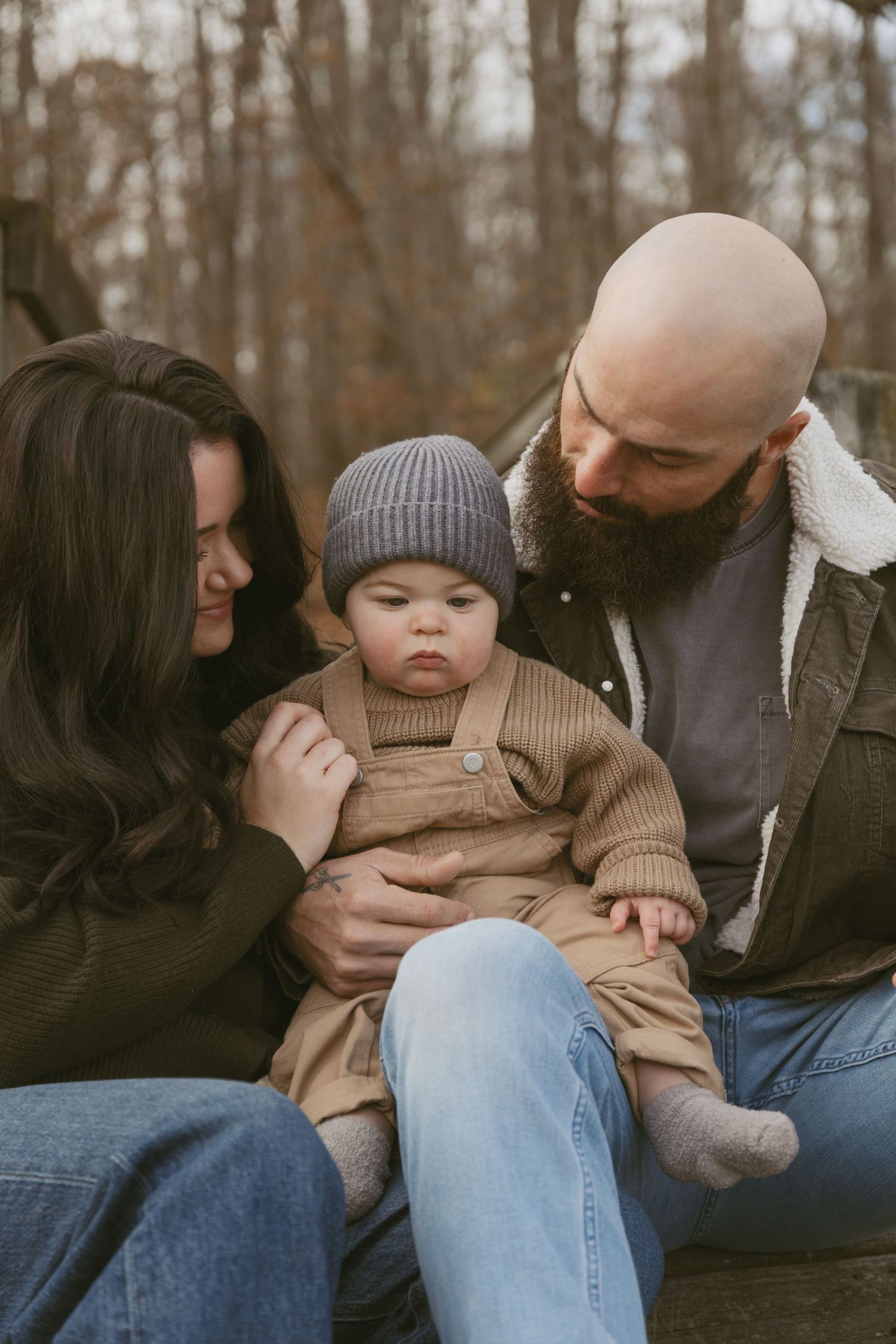 Fall Family Photo in Hudson Valley New York. Emotional storytelling photos, of a mom and dad admiring their baby.