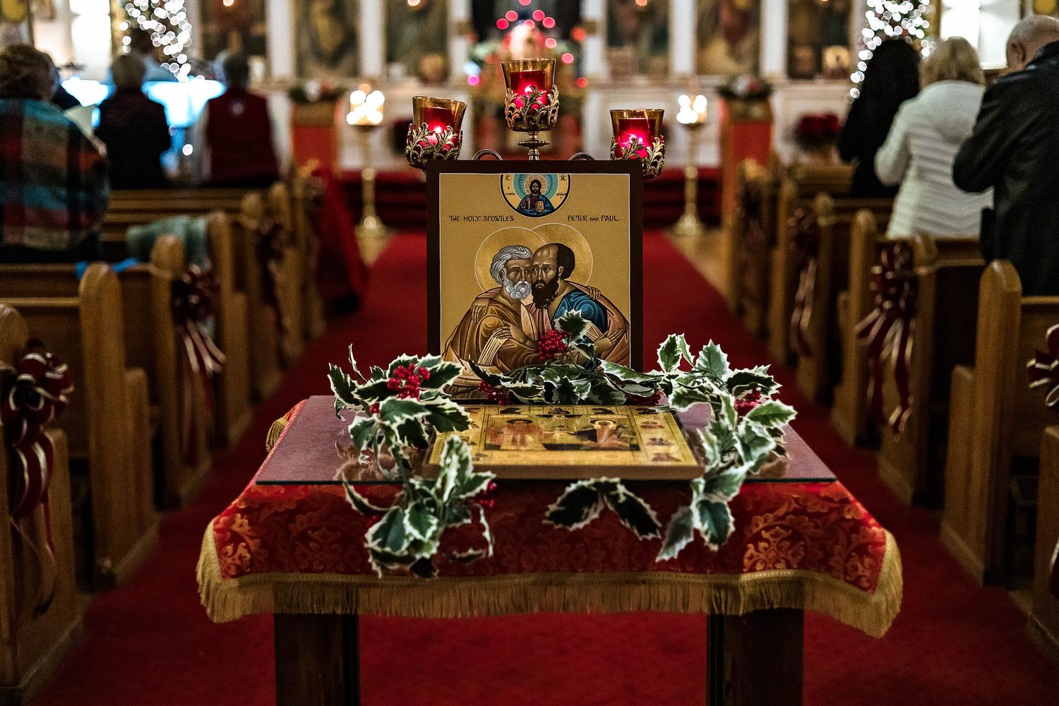 A decorated icon display during a seasonal parish feast in a Western New York Orthodox church.