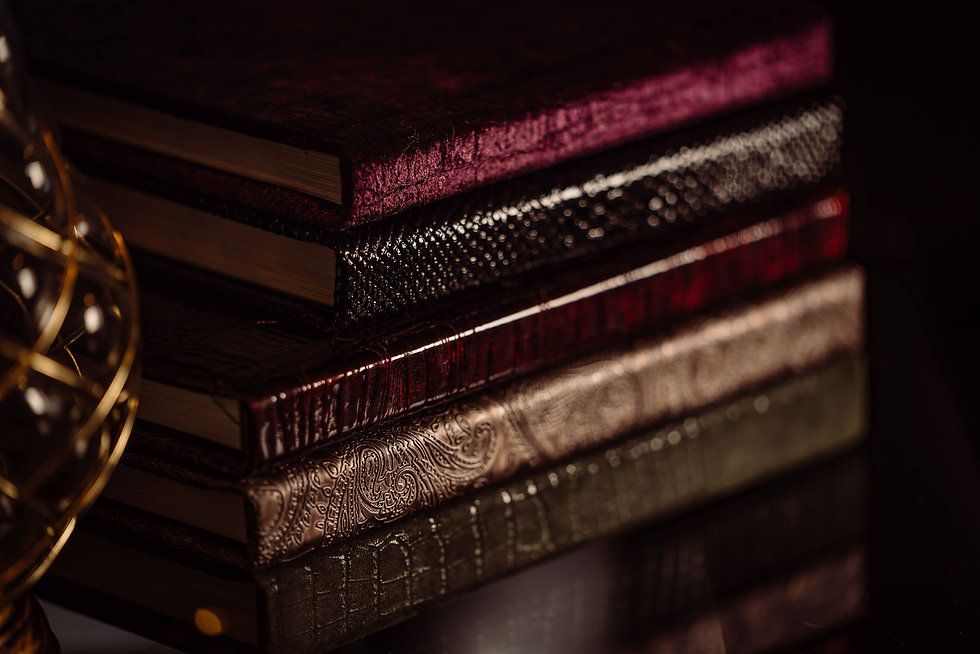 Close-up sequence of luxury leather photo album with textured details.
