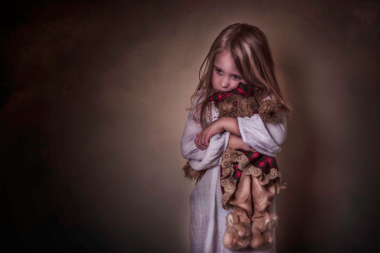 Artistic portrait sequence showing dramatic lighting and shadows.