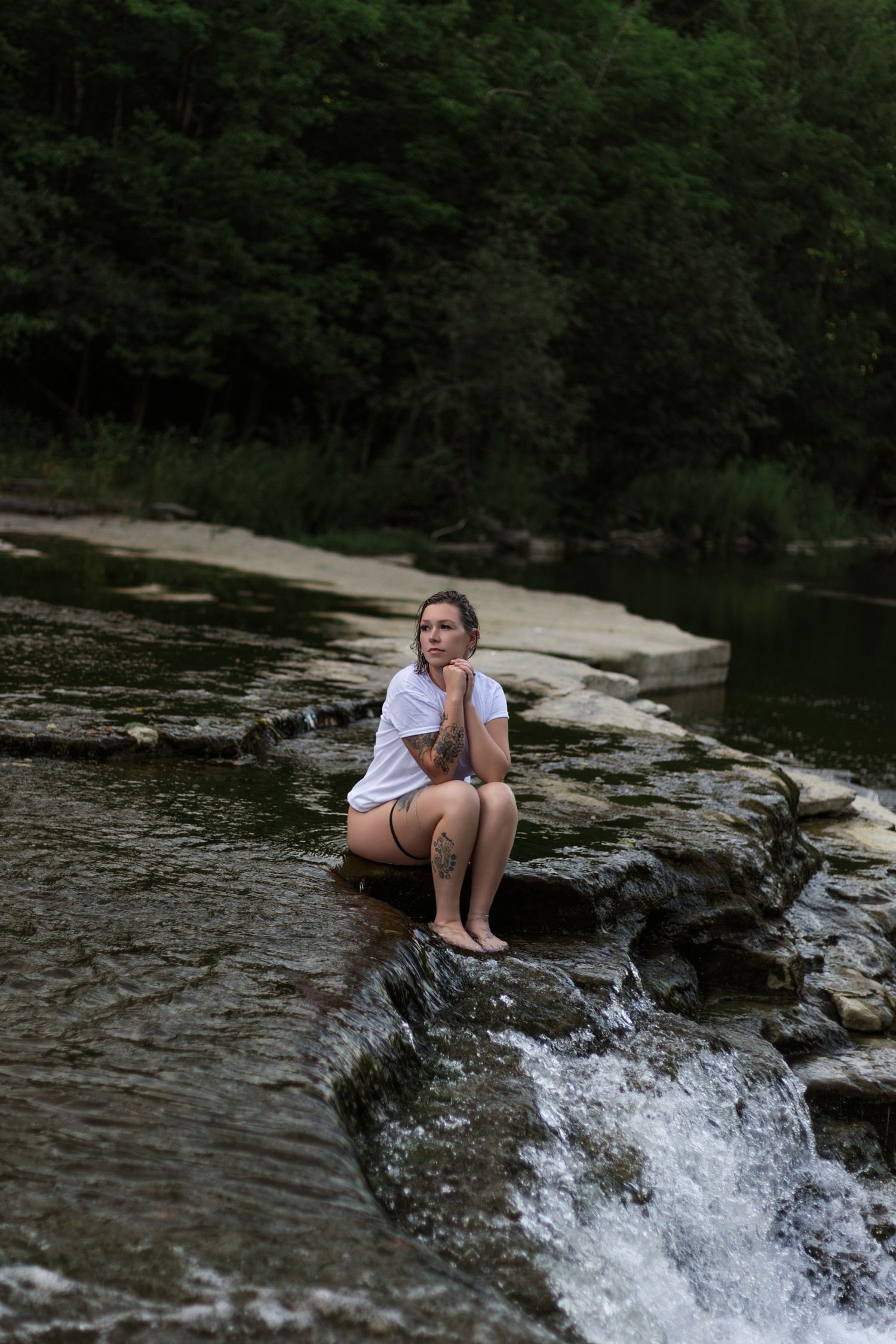 Series of photos showing someone relaxing on rocks by a river.