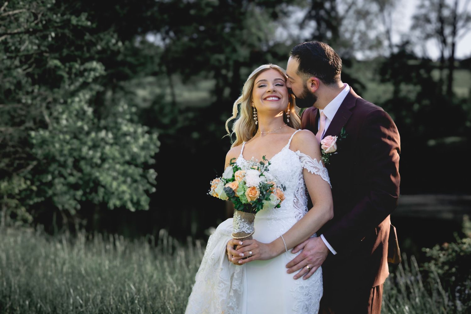 Candid wedding moments captured outdoors with natural greenery and soft lighting.