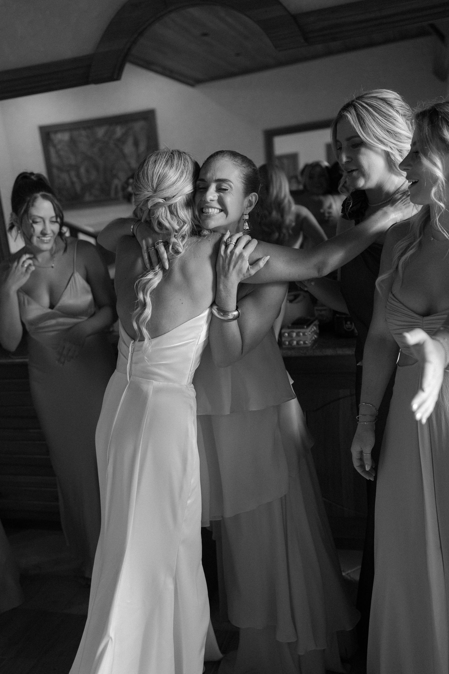 Black and white photos show wedding party members getting ready in formal attire.