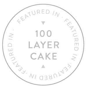 Circular gray stamps with text arranged in a repeating pattern.