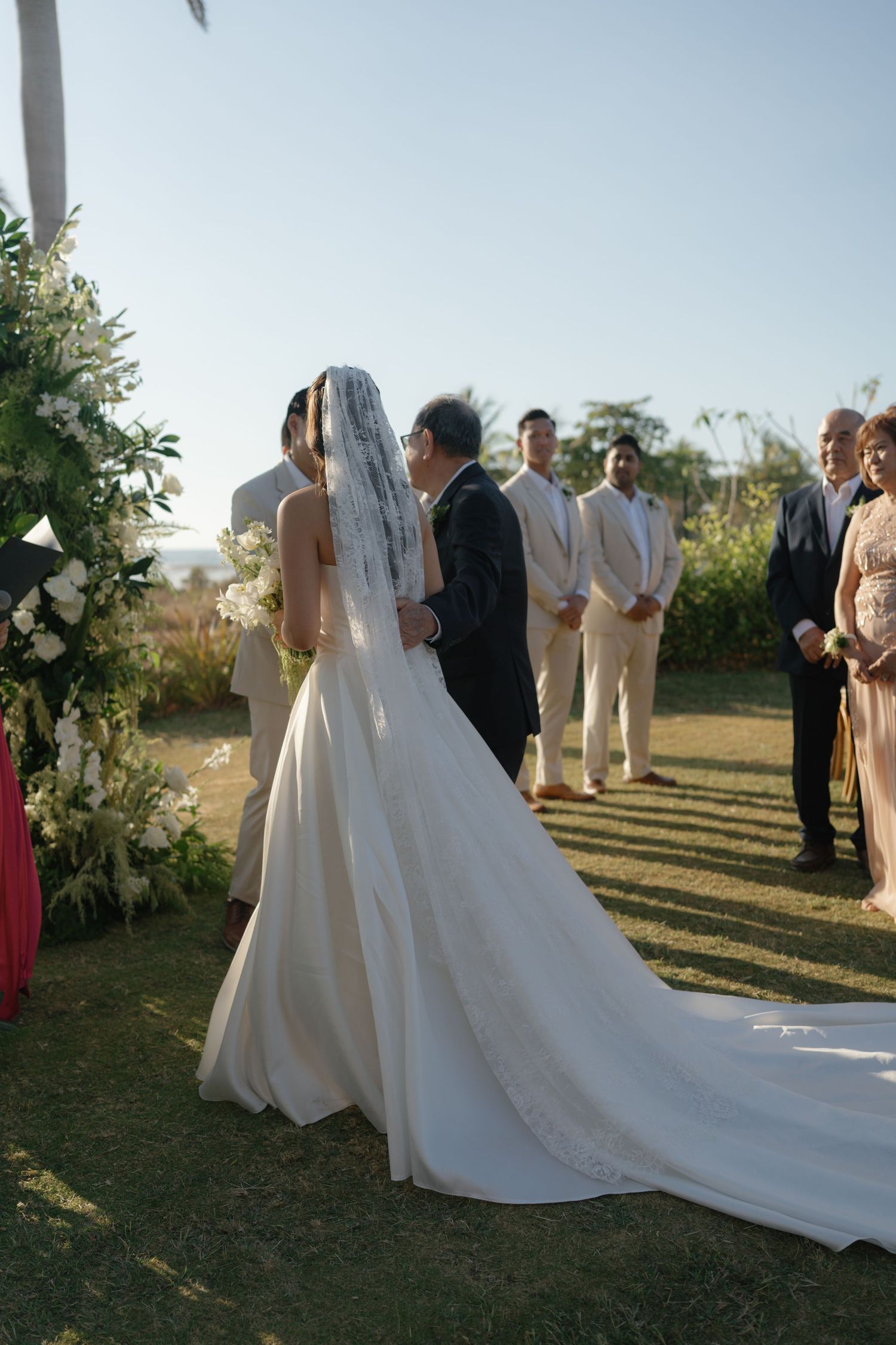 A series of wedding ceremony photos showing a bride and groom in an outdoor garden setting during golden hour.
