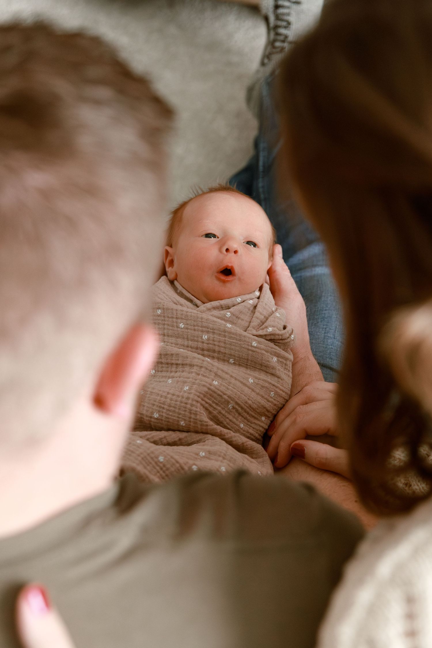 Close-up series showing gentle baby details in soft natural lighting.