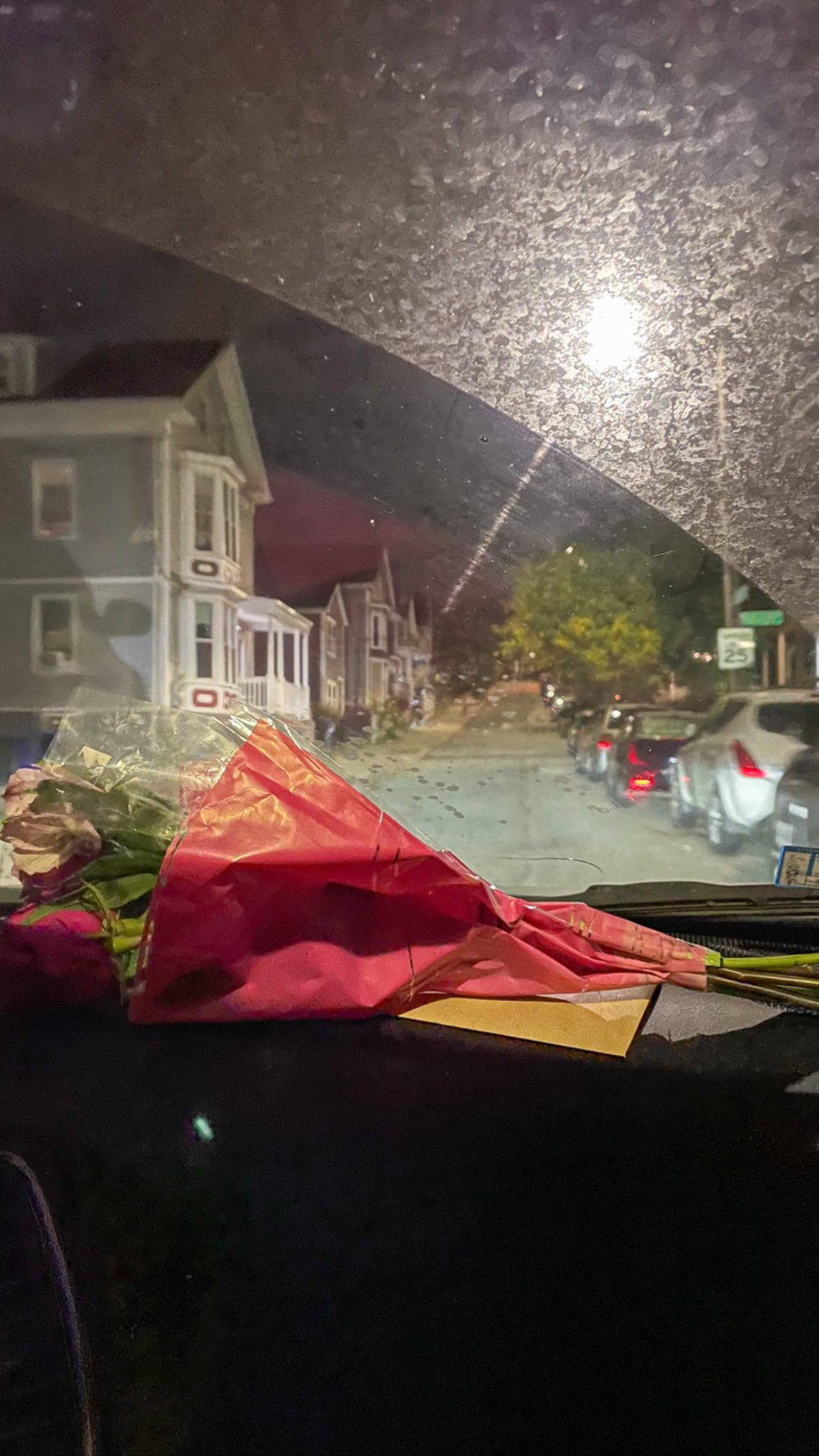 A series of dark nighttime photos showing a red McDonald's drive-thru sign and buildings in a residential area.