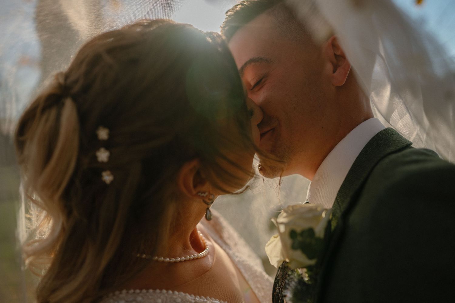Romantic wedding photography sequence capturing intimate moments in soft lighting.
