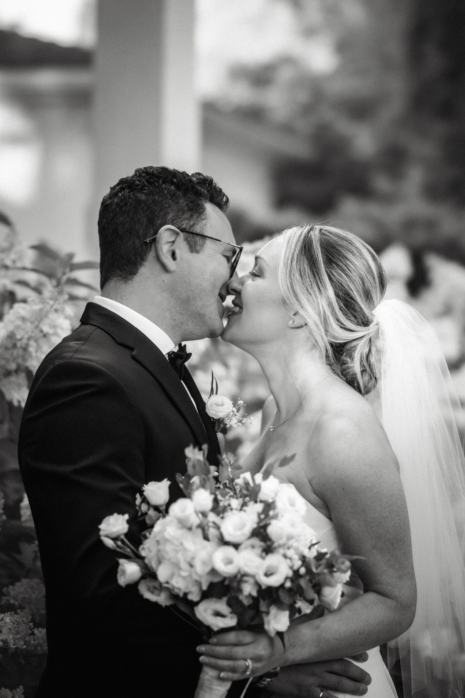 Intimate wedding portraits showing tender moments between newlyweds.