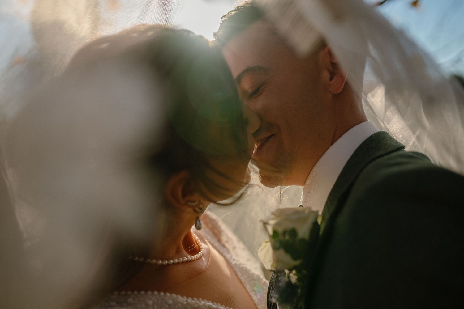 A dreamy wedding photograph with soft lighting and romantic atmosphere.