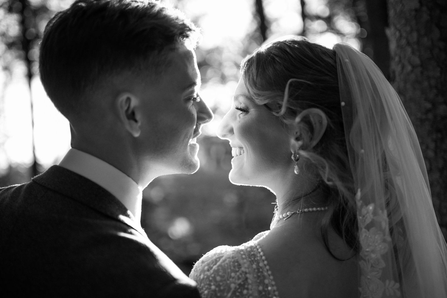 A romantic wedding photo sequence showing intimate moments between newlyweds in black and white.