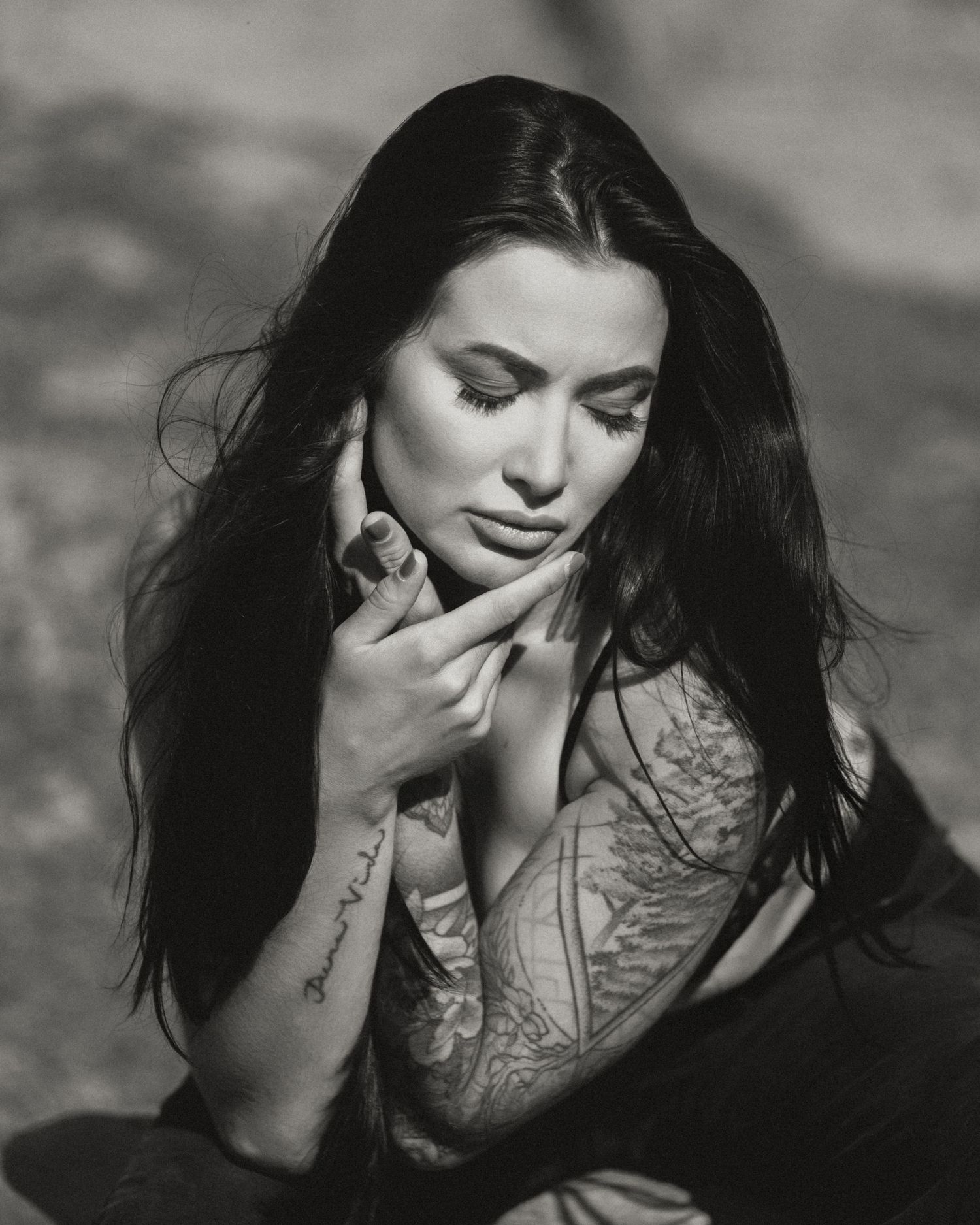 Emotional black and white portrait series showing contemplative poses.
