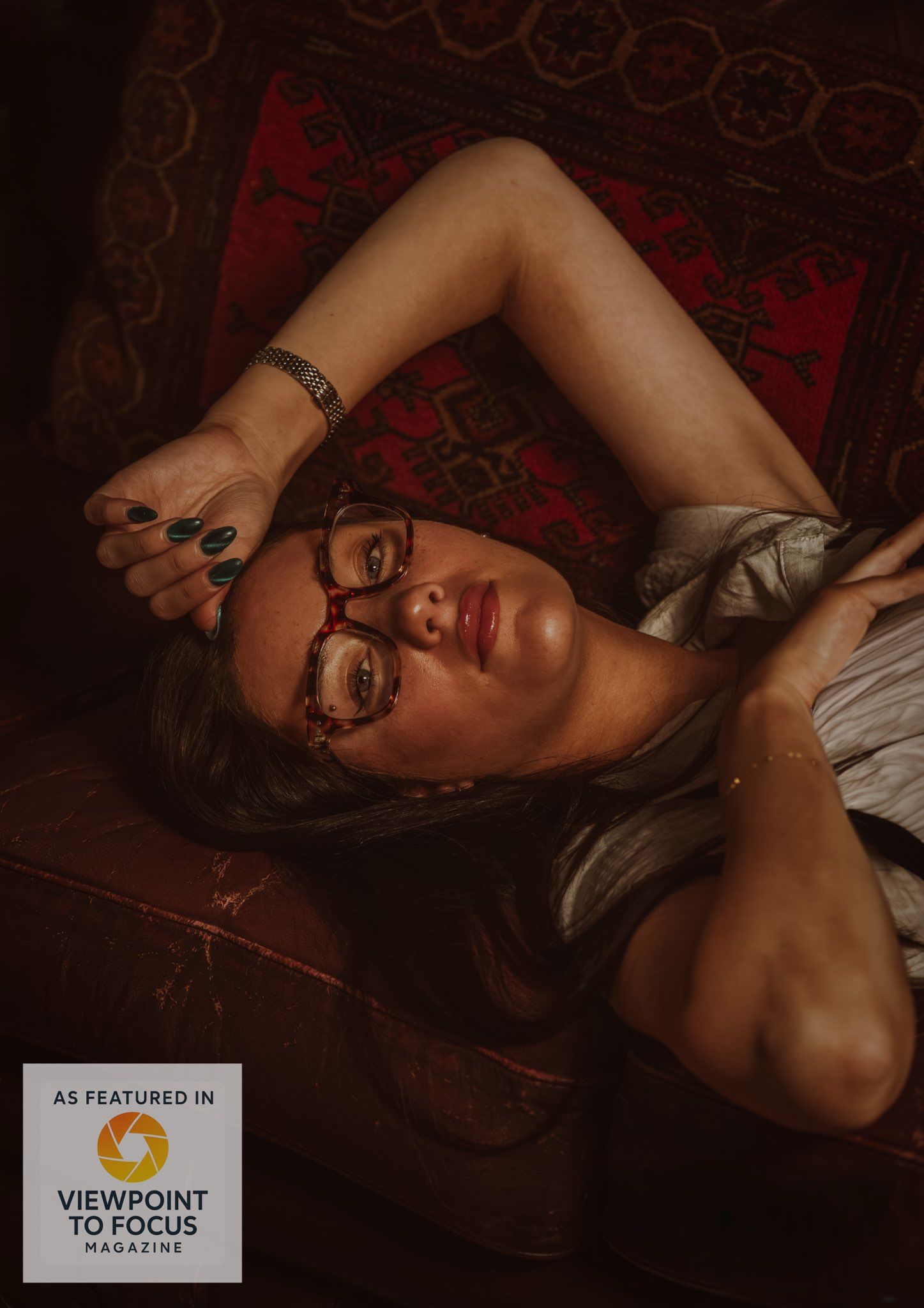 Artistic boudoir photography series with moody red lighting and dark shadows on textured background.