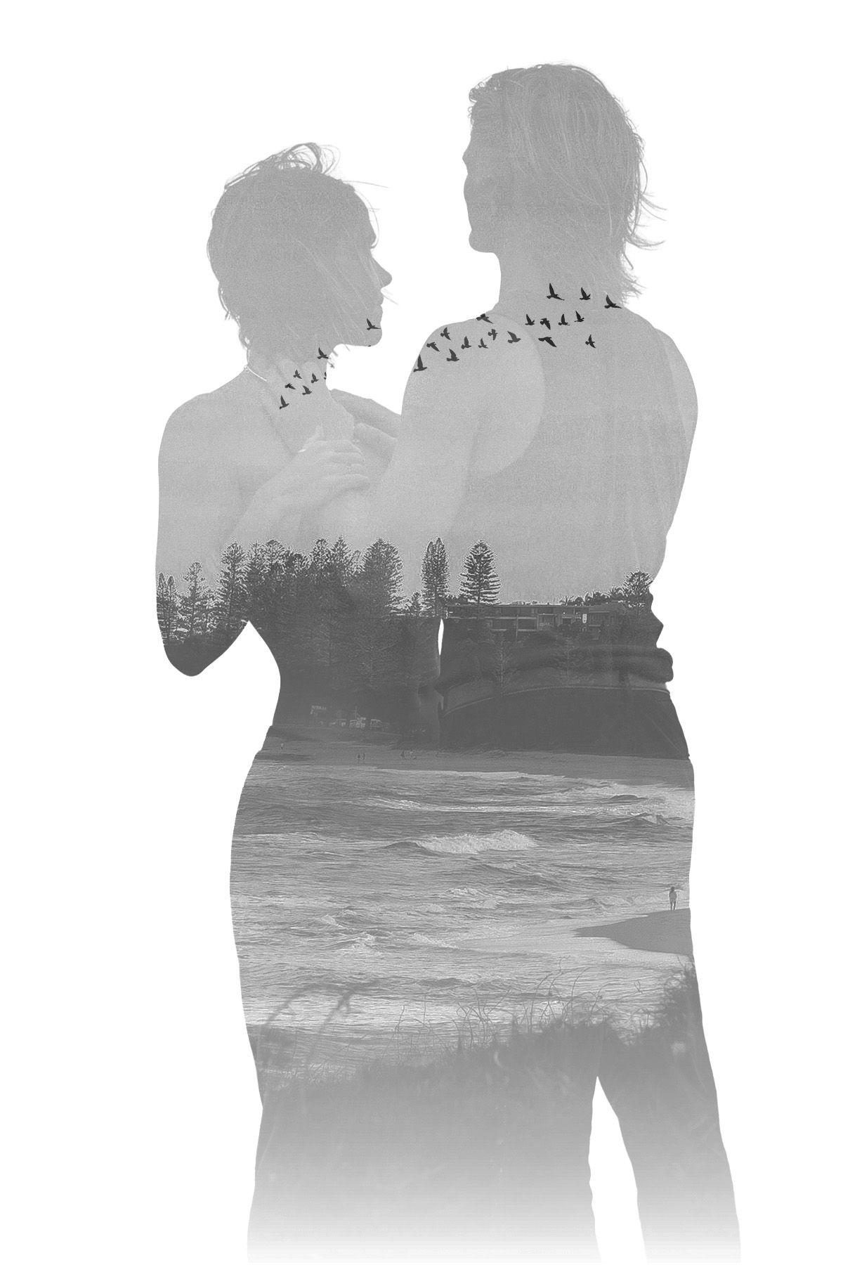 Black and white double exposure of couple embracing with ocean waves and pine trees silhouette.