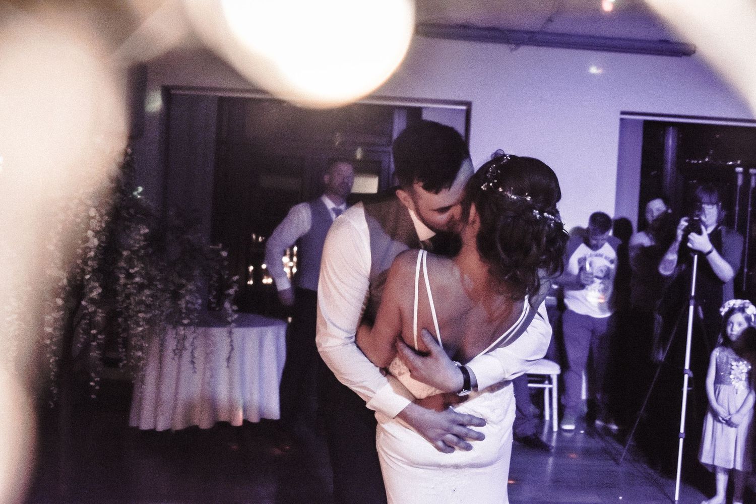Newlyweds sharing a romantic first dance at Canada Lodge in Cardiff