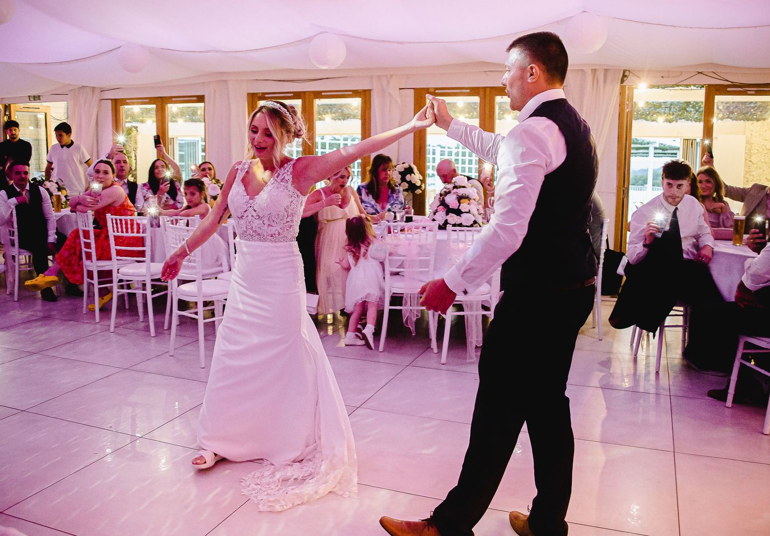 Bride twirling during her first dance at Ridgeway Golf Club