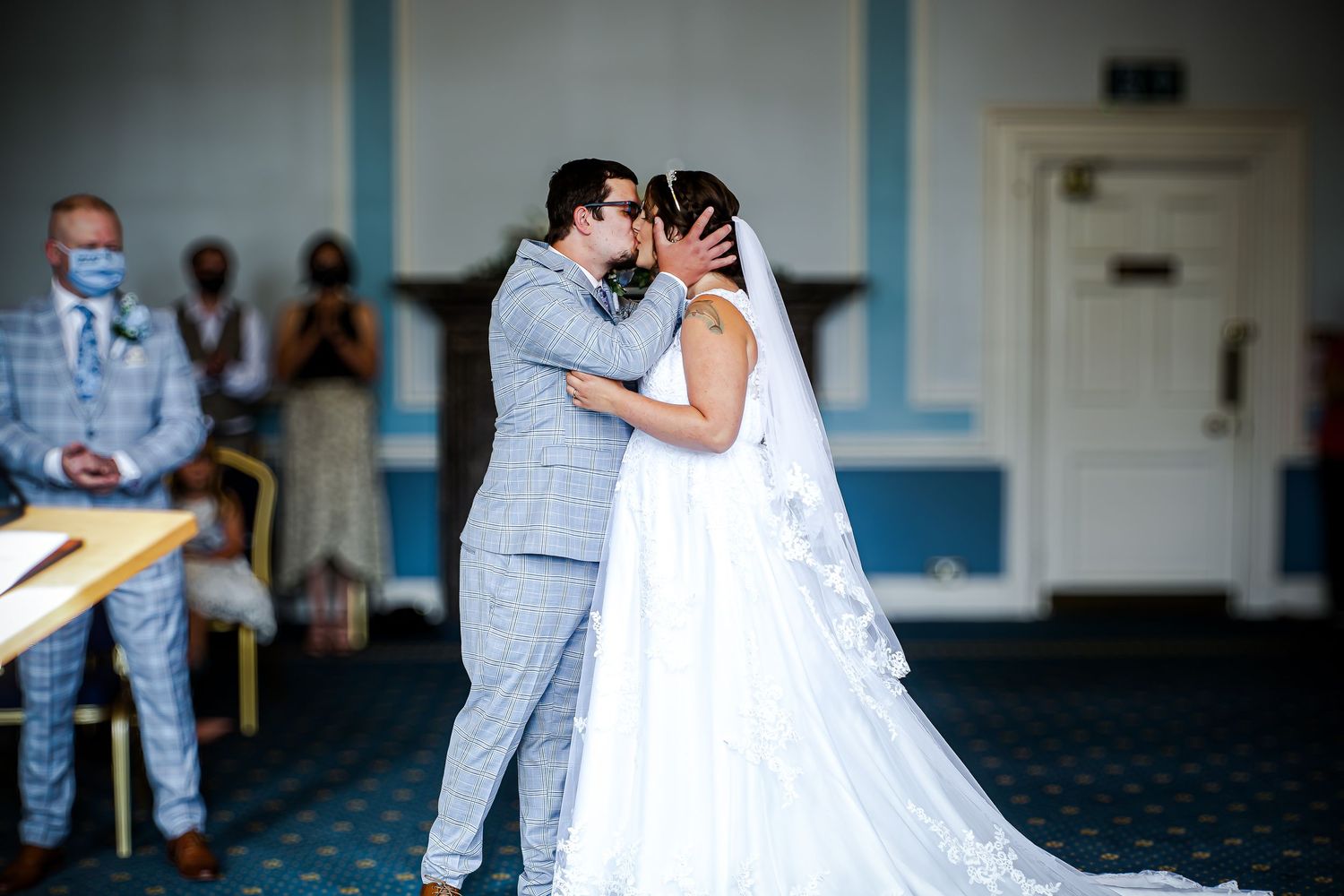 Bride and groom first kiss during their Cardiff City Hall ceremony