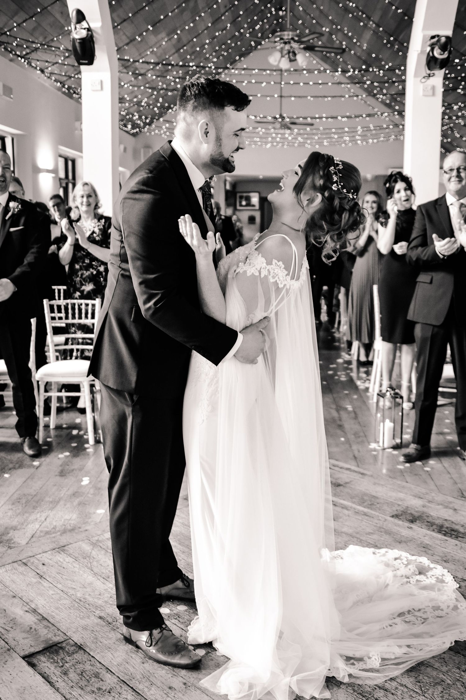 Black and white photograph of the couple’s first kiss at Canada Lodge