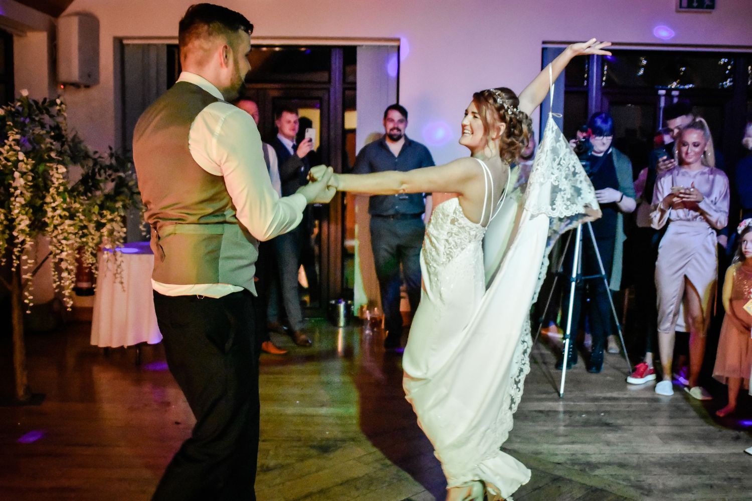 Bride and groom dancing with their wedding guests at Canada Lodge, Cardiff