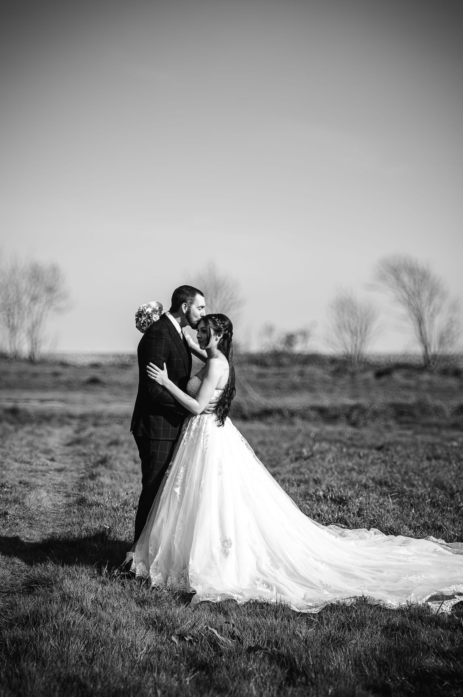 Black-and-white wedding portrait in the grounds of Porthkerry Park