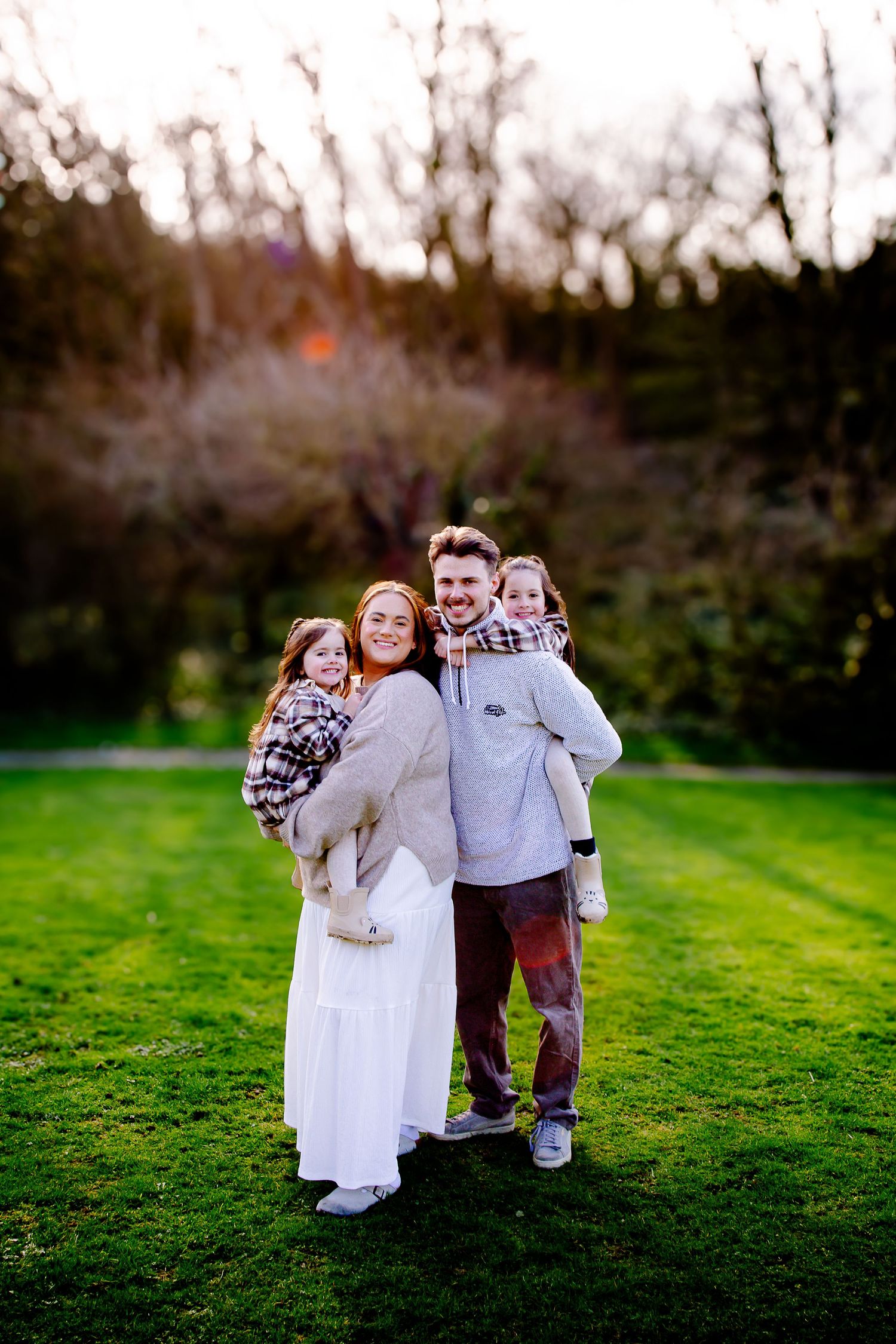 Mother standing with her two daughters during a Southerndown family shoot
