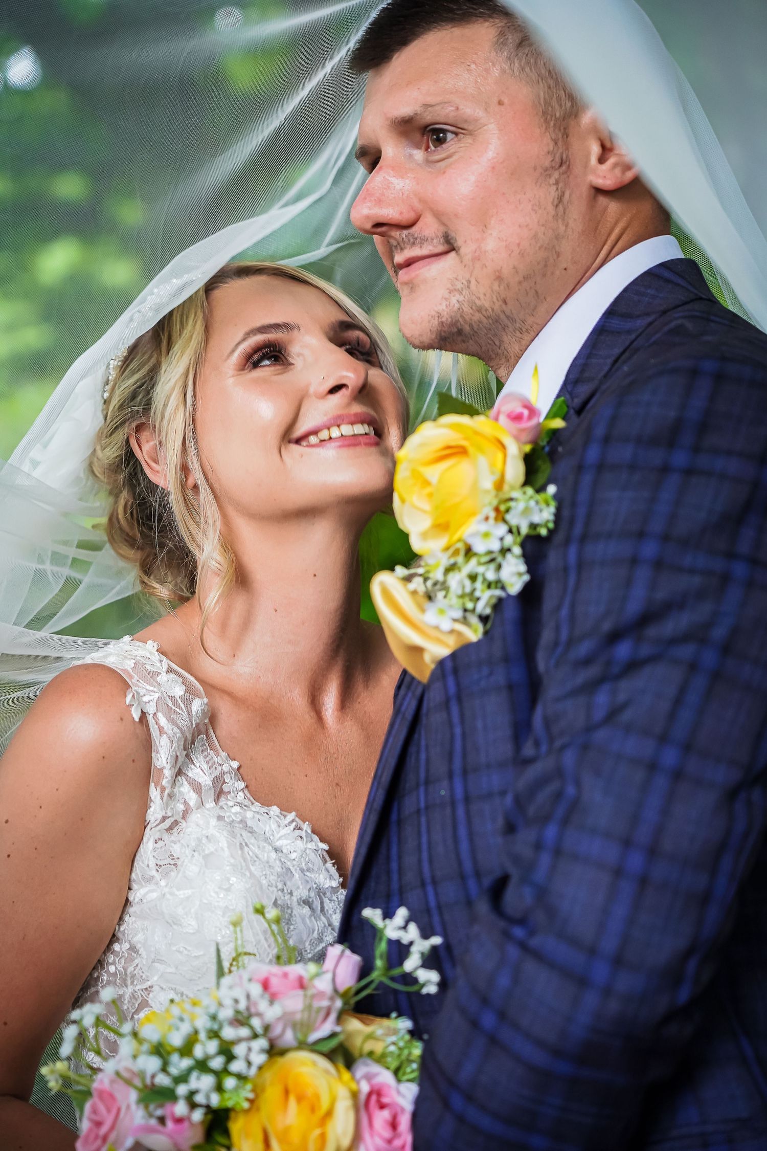 Bride smiling up at her groom during their Ridgeway Golf Club wedding