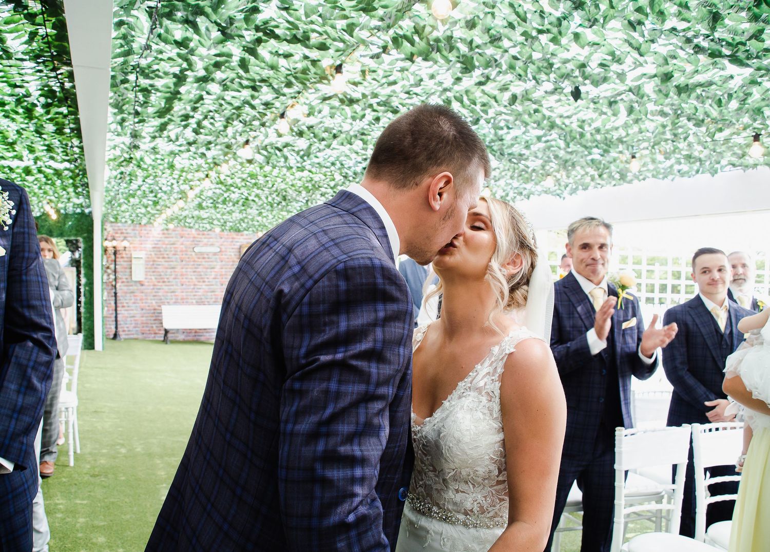 Bride and groom kissing during their Ridgeway Golf Club ceremony