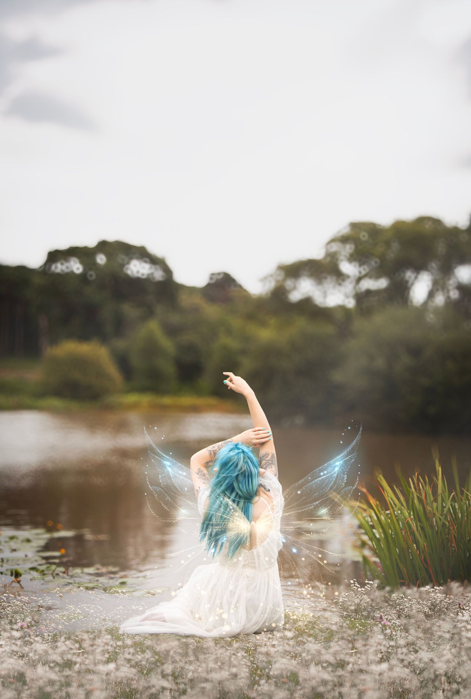 Whimsical fairy portrait beside a peaceful lake