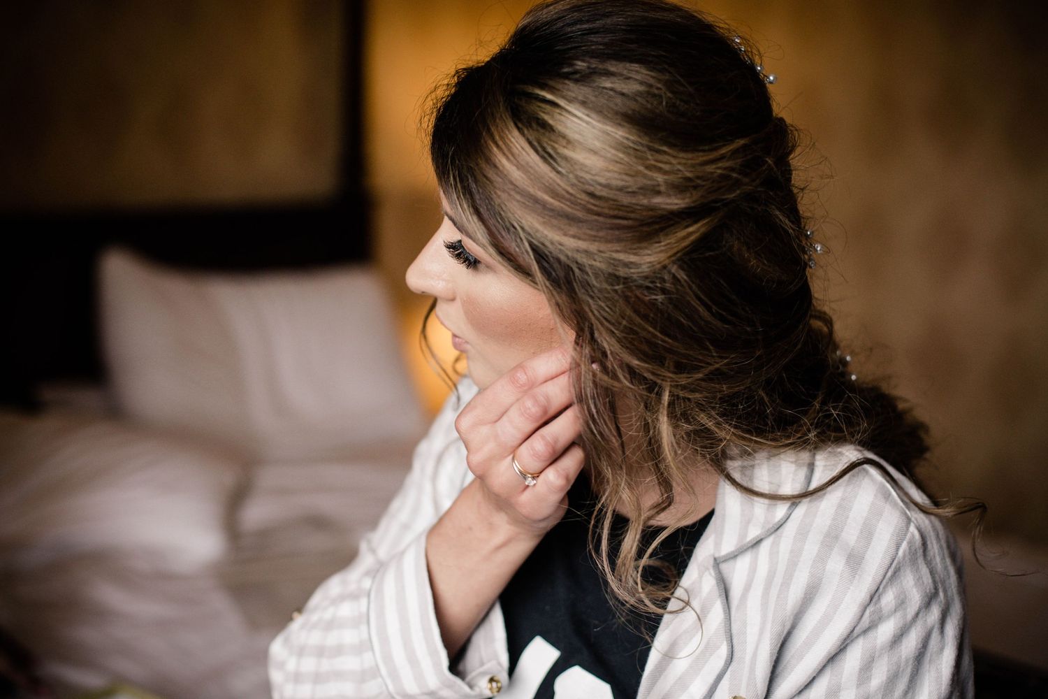 Brides applying makeup while preparing for the Pencoed House wedding