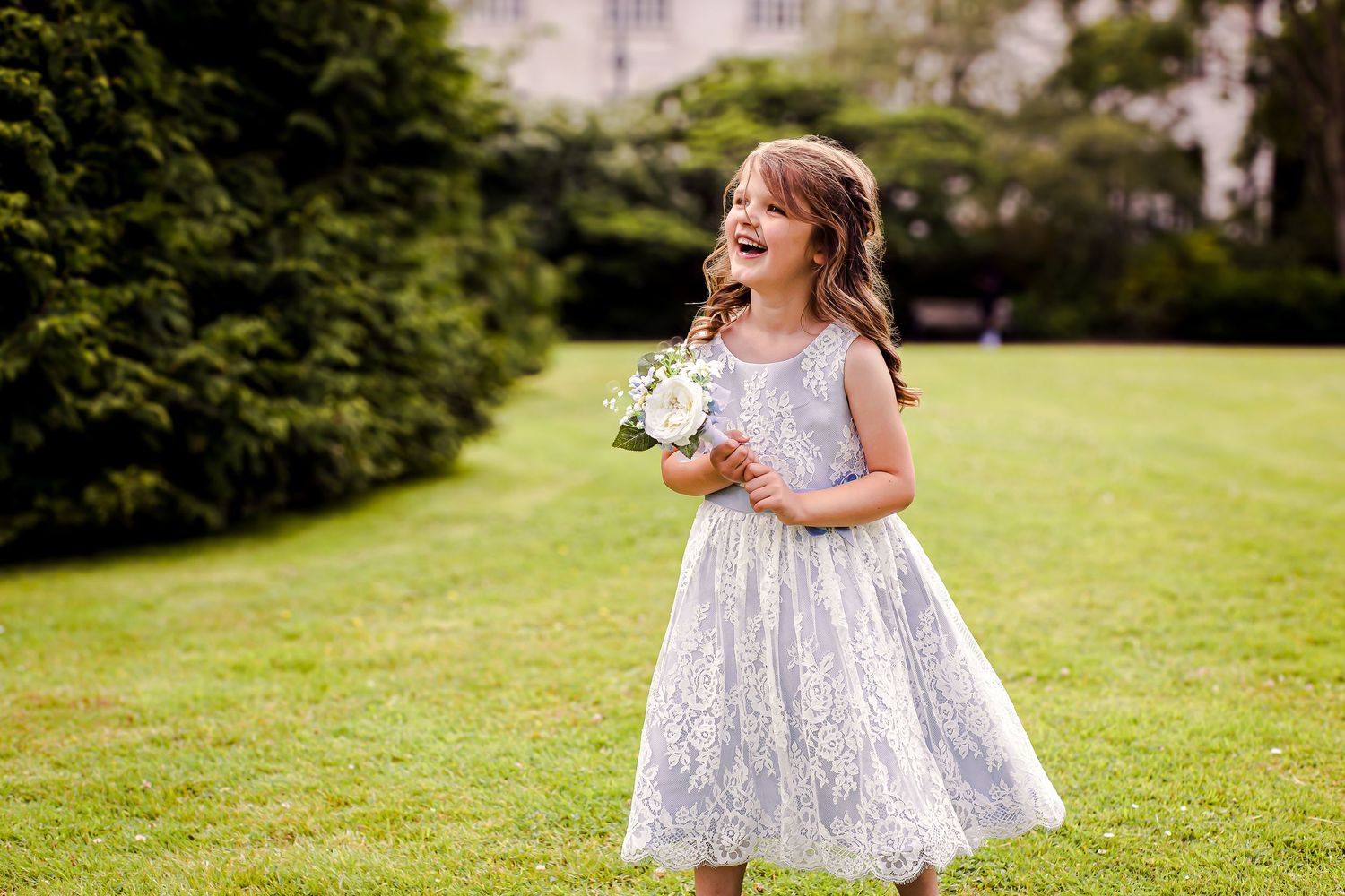 Flower girl laughing Sophia Gardens, Cardiff