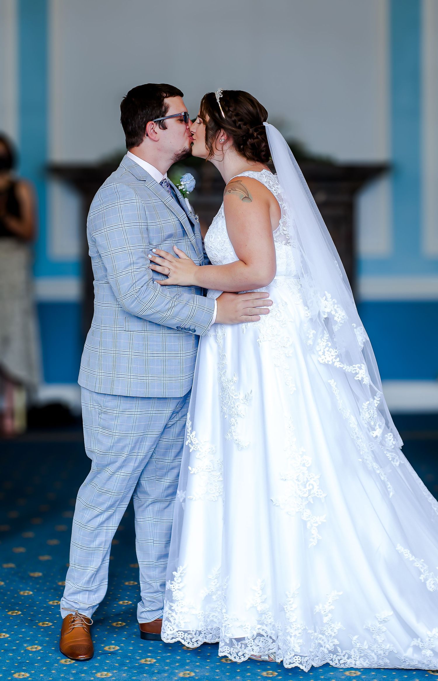 Bride and groom first kiss during their Cardiff City Hall ceremony