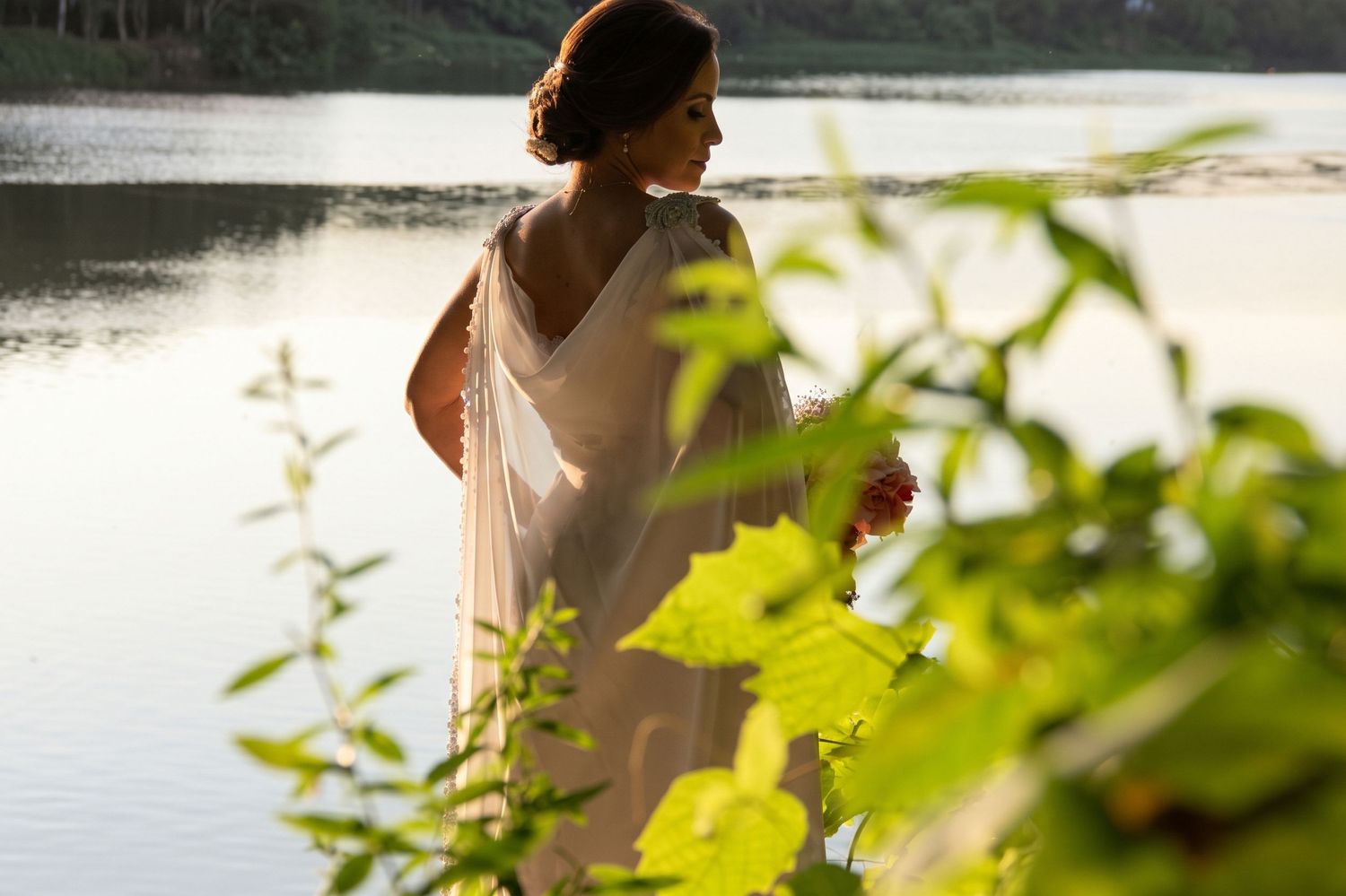 Bride portrait by the water during golden hour - Philadelphia wedding services